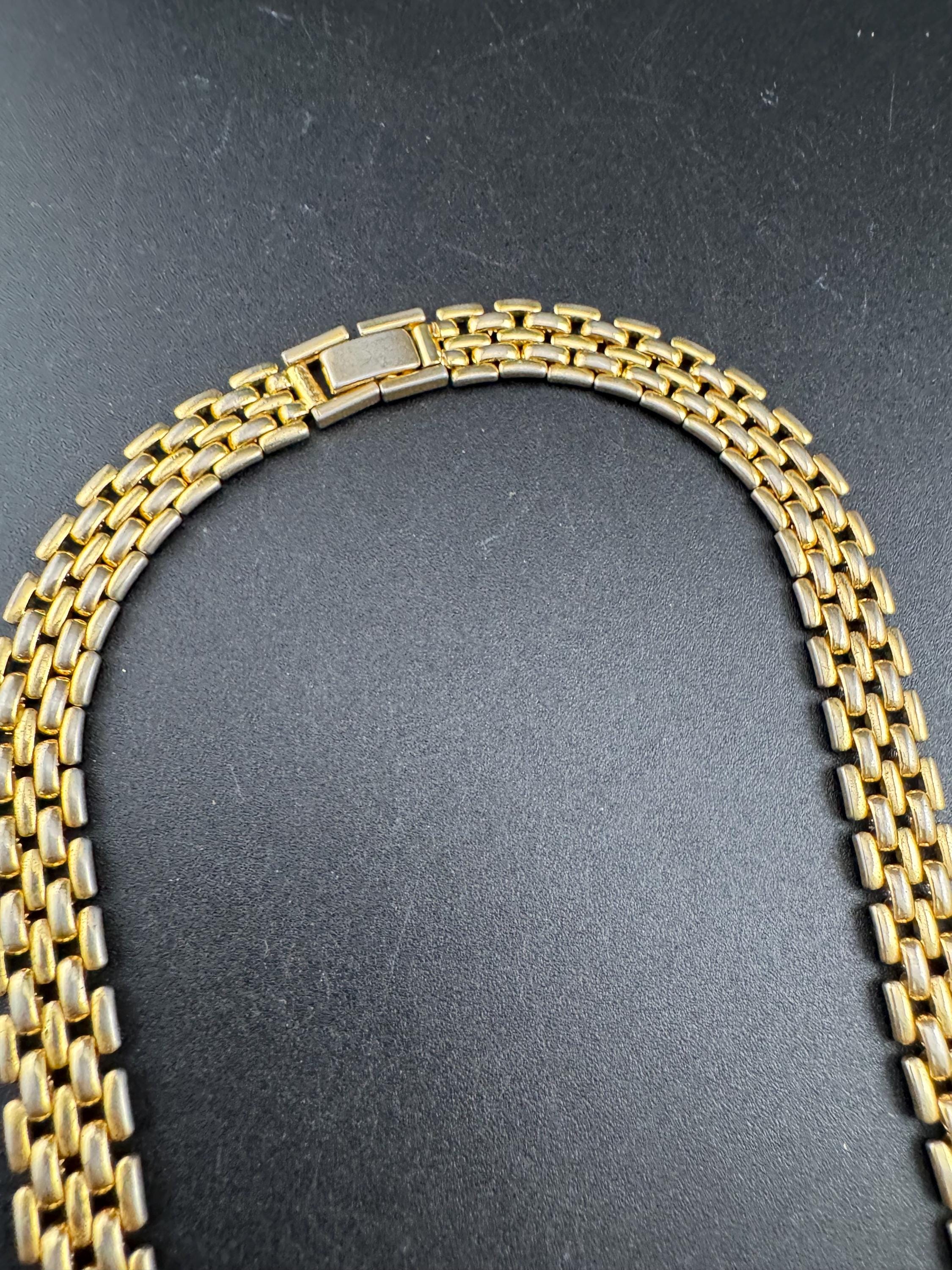 Retro 1980s slim panther link faded gold tone choker necklace