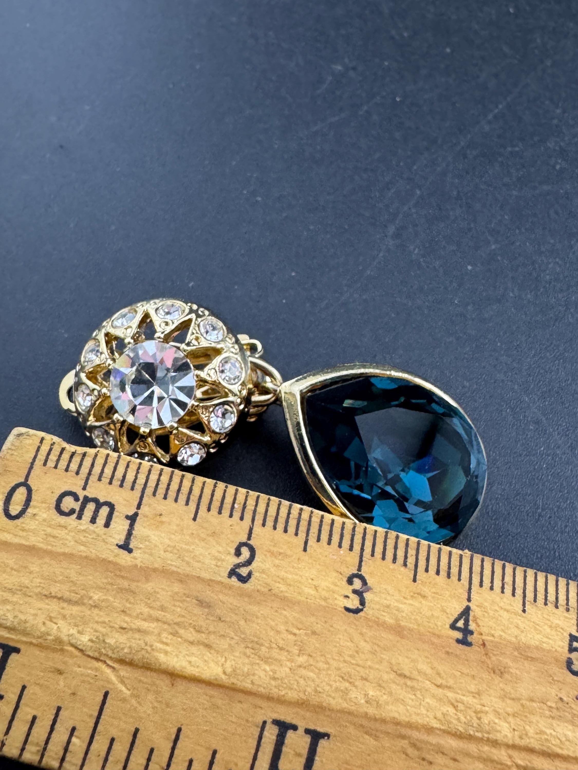 Sapphire blue teardrop Crystal clip on dangly Earrings: Swarovski, Gold Tone, 1980s Stock