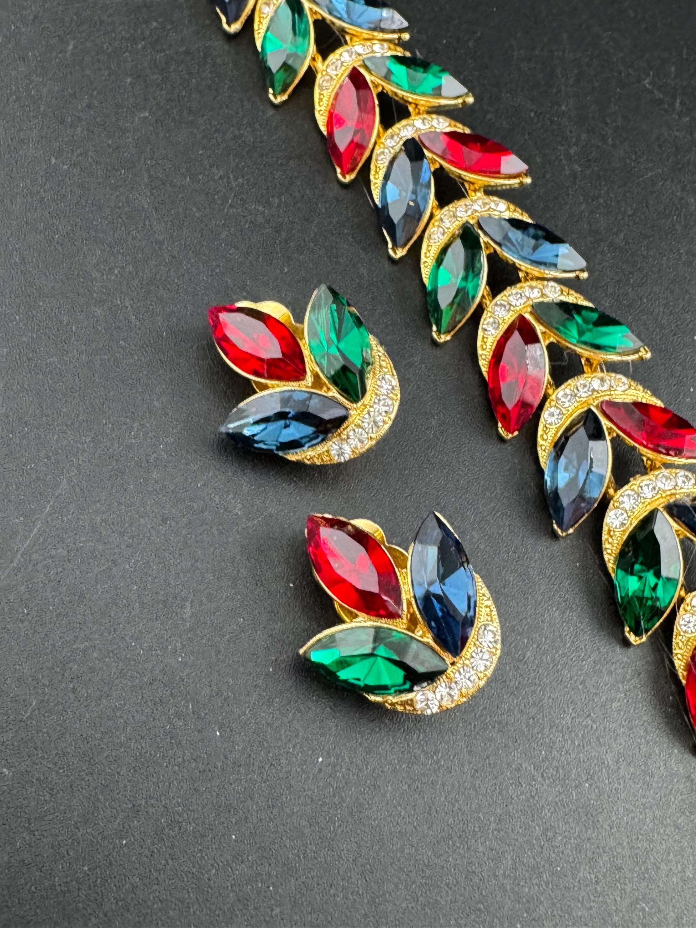 Vintage Swarovski Crystal Jewelry Set: Gold Tone Leaf Bracelet and Clip Earrings