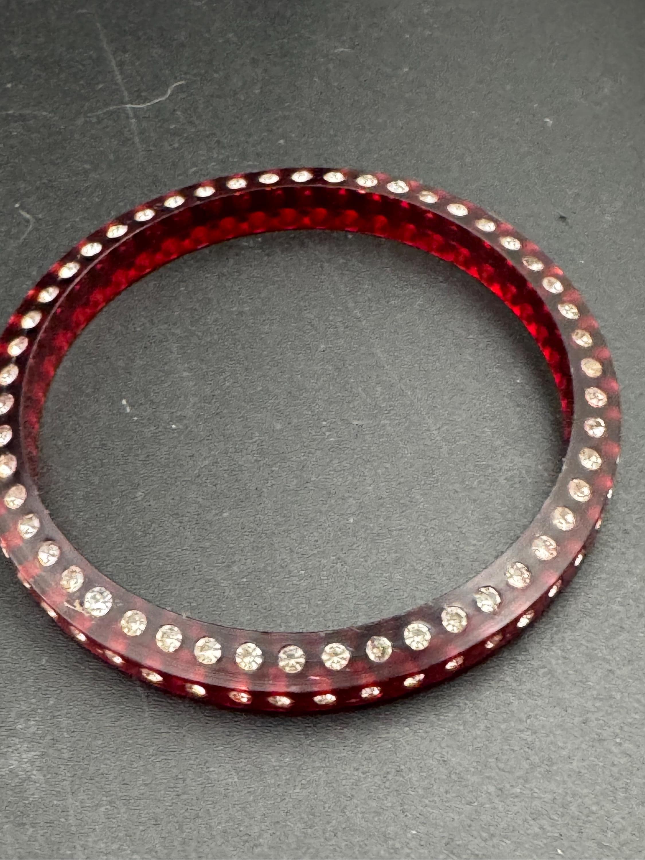 Art Deco early root beer red plastic sparkly paste bangle.