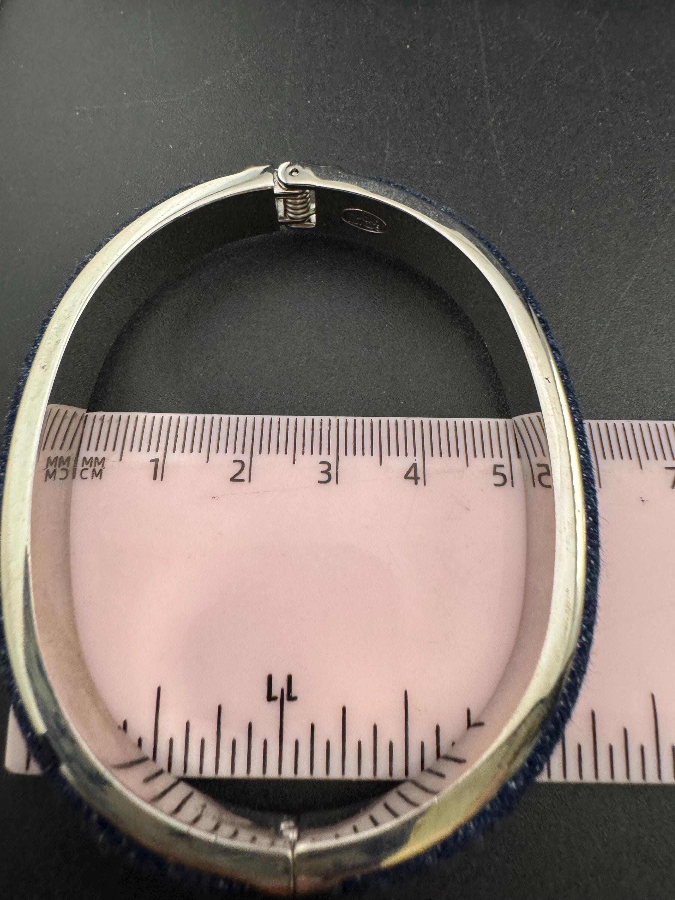 Signed Joan rivers denim blue clamper bangle: silver plated bracelet