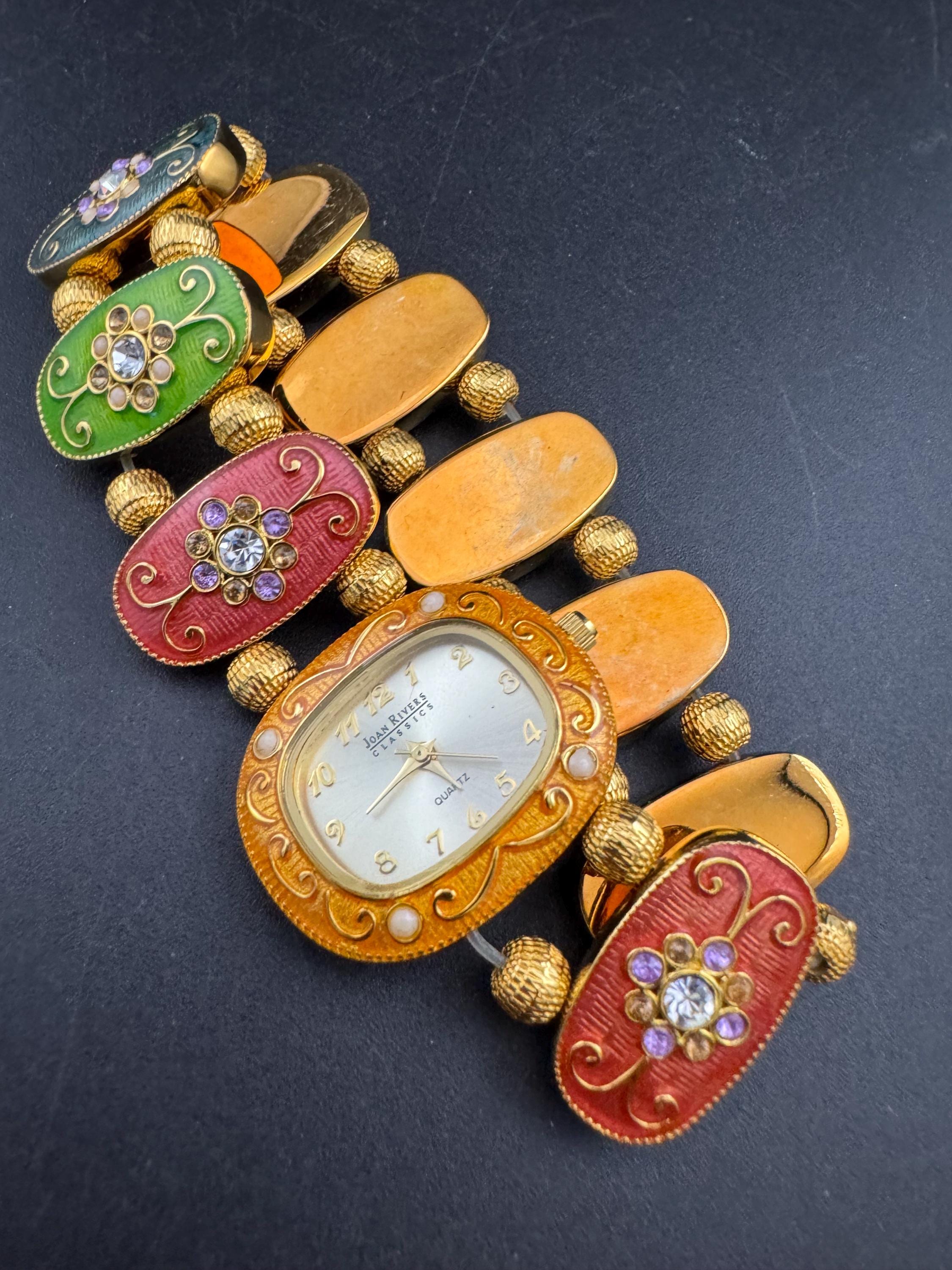 Signed Joan rivers enamelled floral panel link bracelet watch, elasticated
