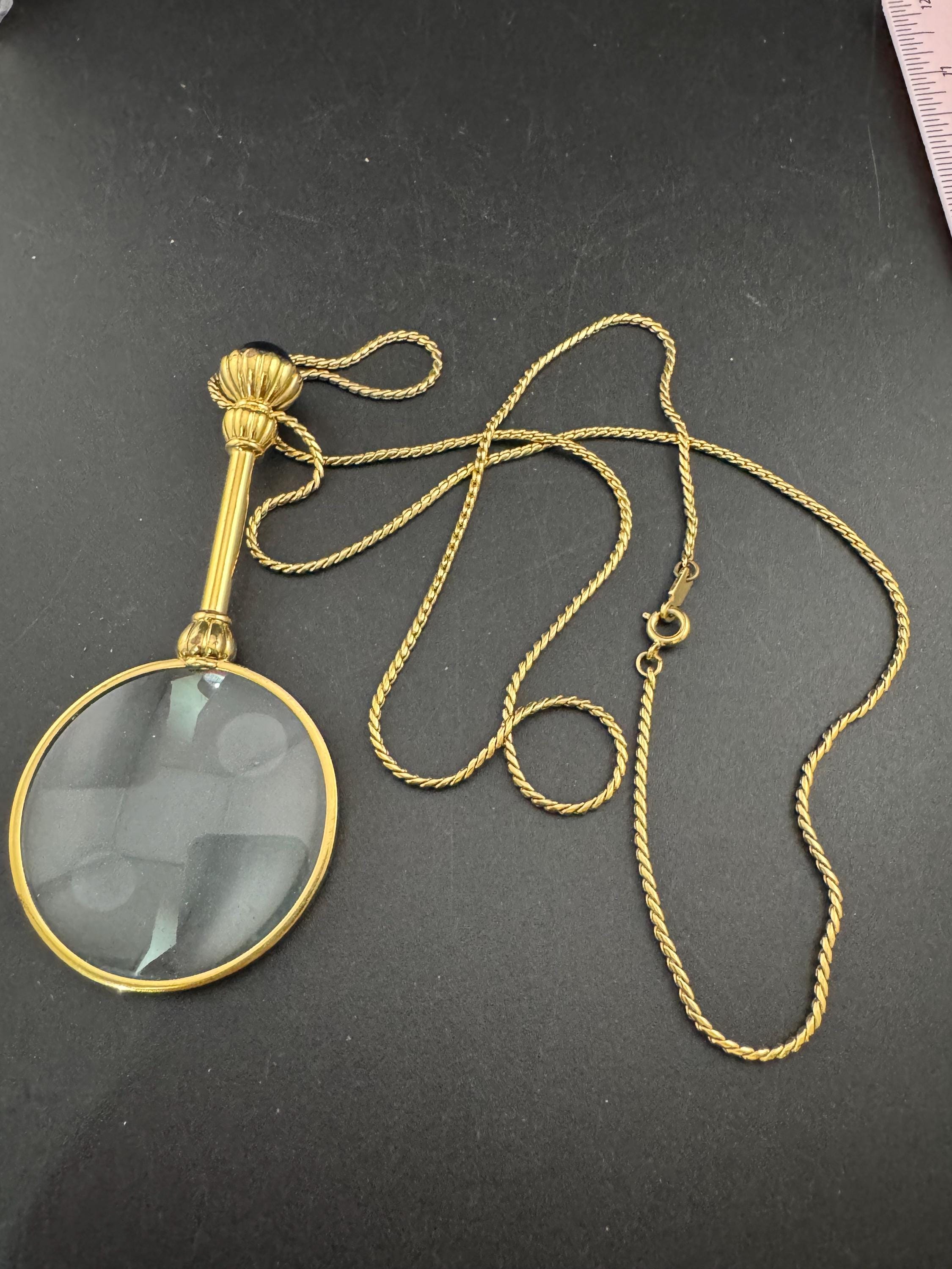 Vintage jewellers loupe eyeglass magnifier pendant necklace, gold plated with blue glass cabochon