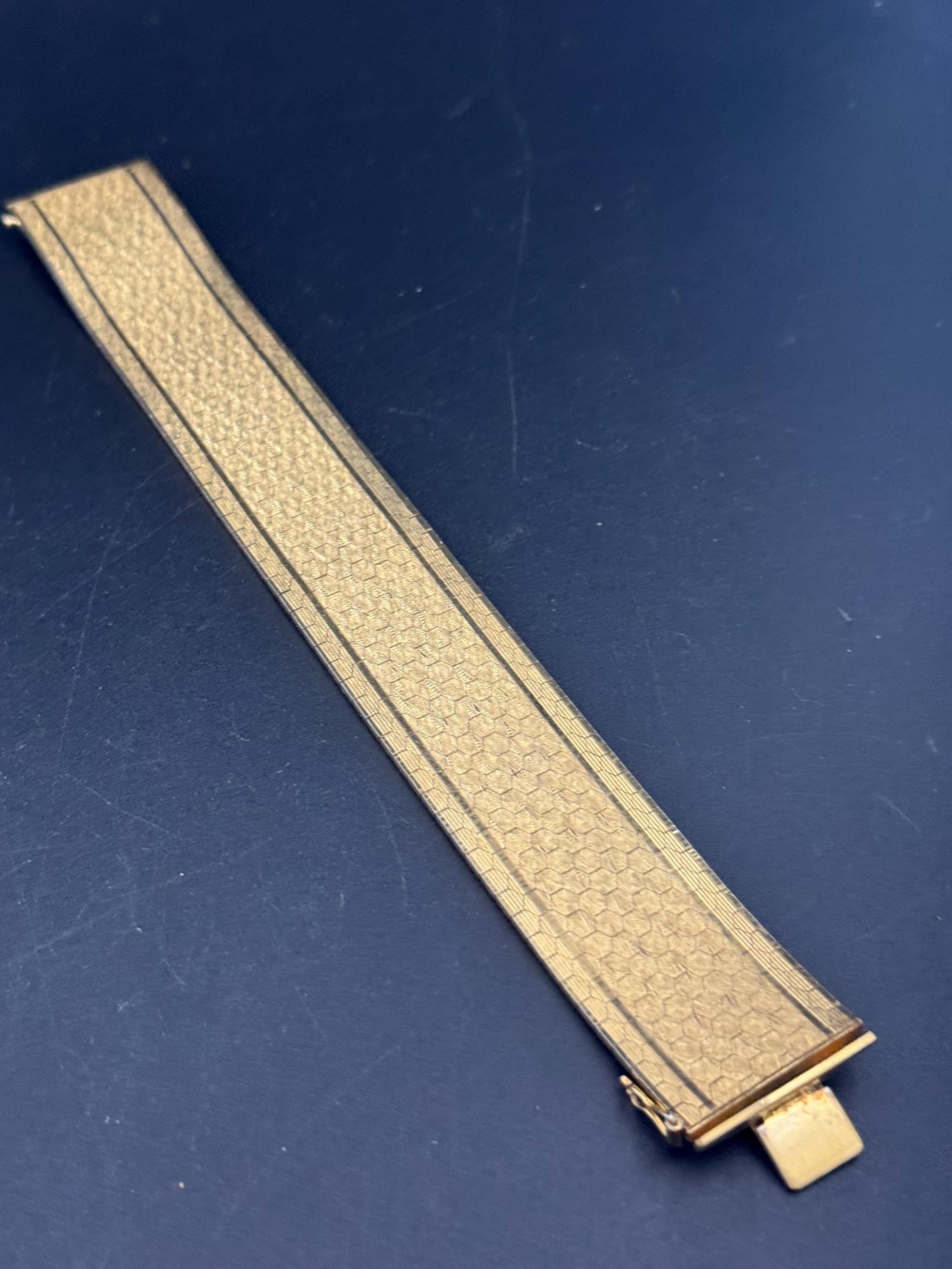 1970s 18k GP flat 2.6cm wide articulated cuff bracelet, Italian gold plated
