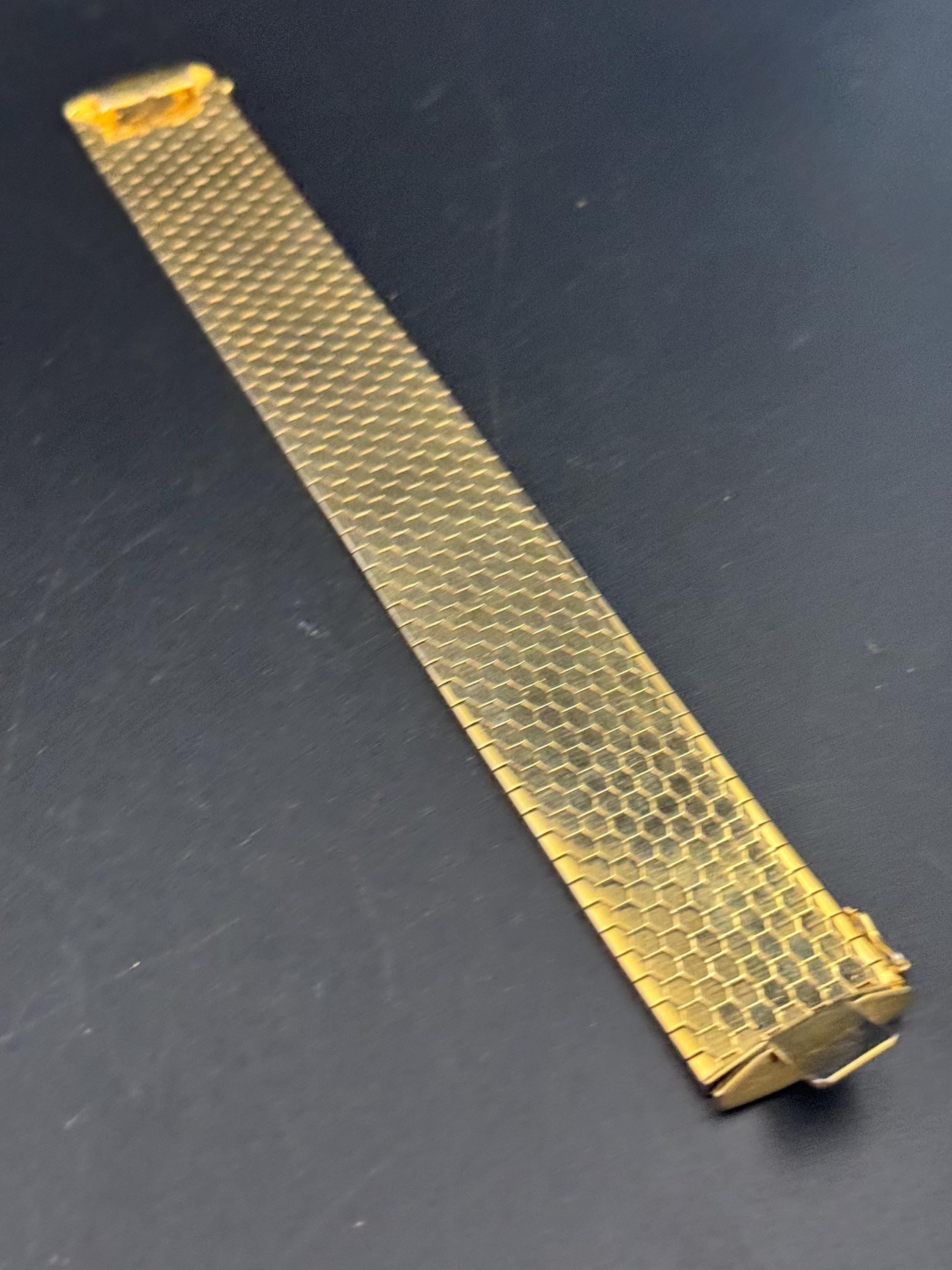 1970s 18k GP flat 2.6cm wide articulated cuff bracelet, Italian gold plated