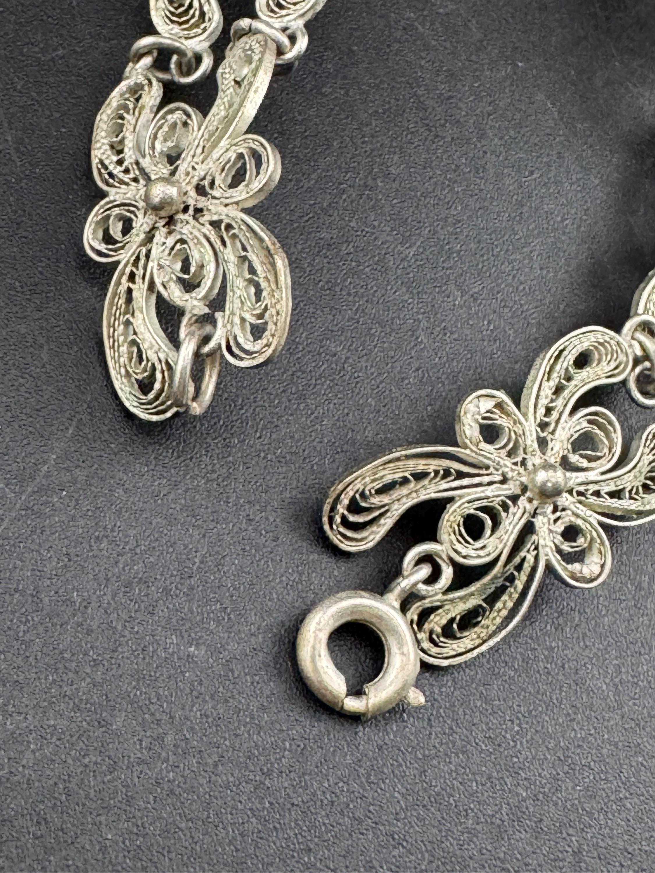 Antique vintage continental sterling silver panel link filigree bracelet.