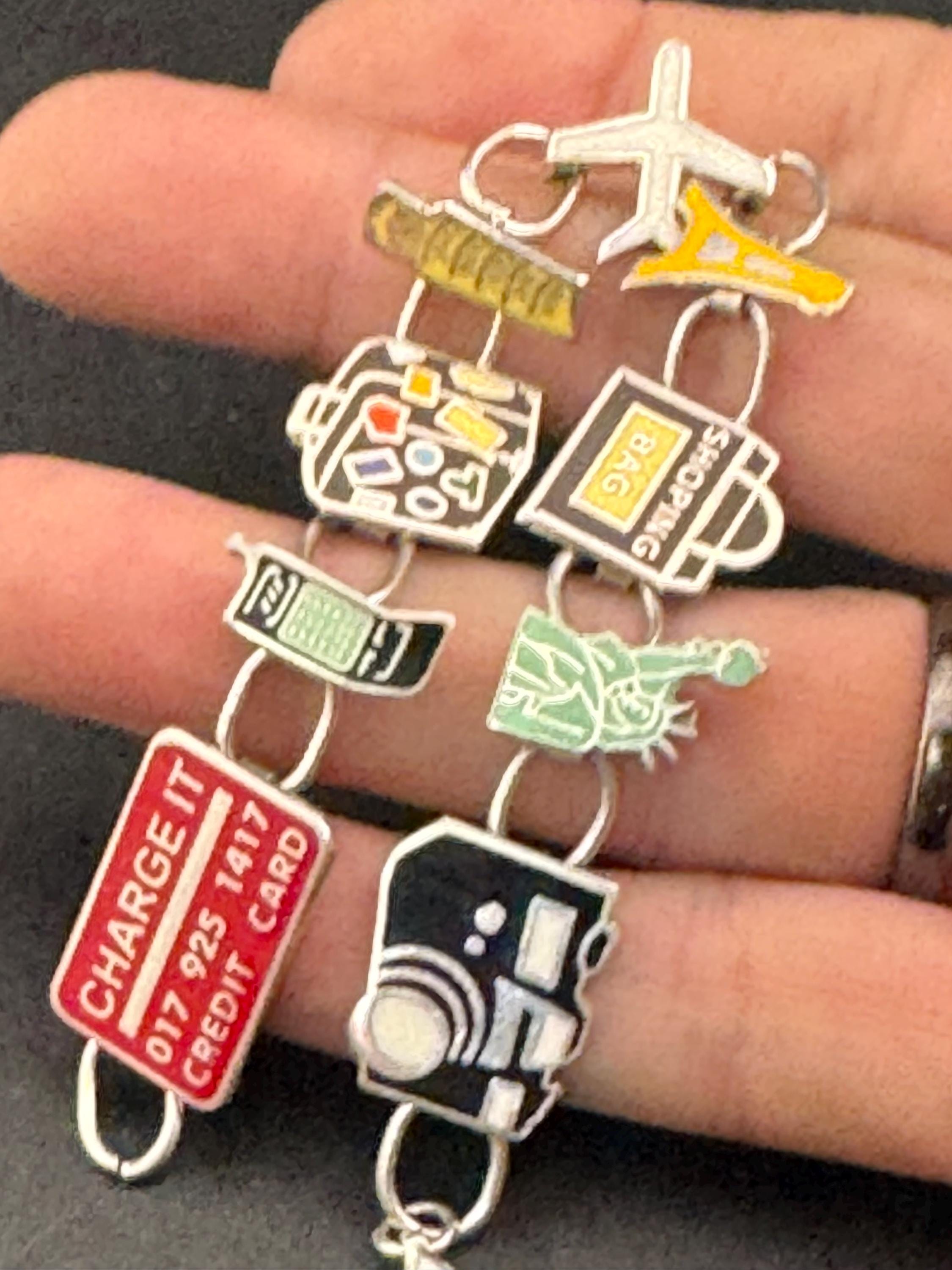 Quirky retro 925 travel themed charm bracelet, panel link in sterling silver