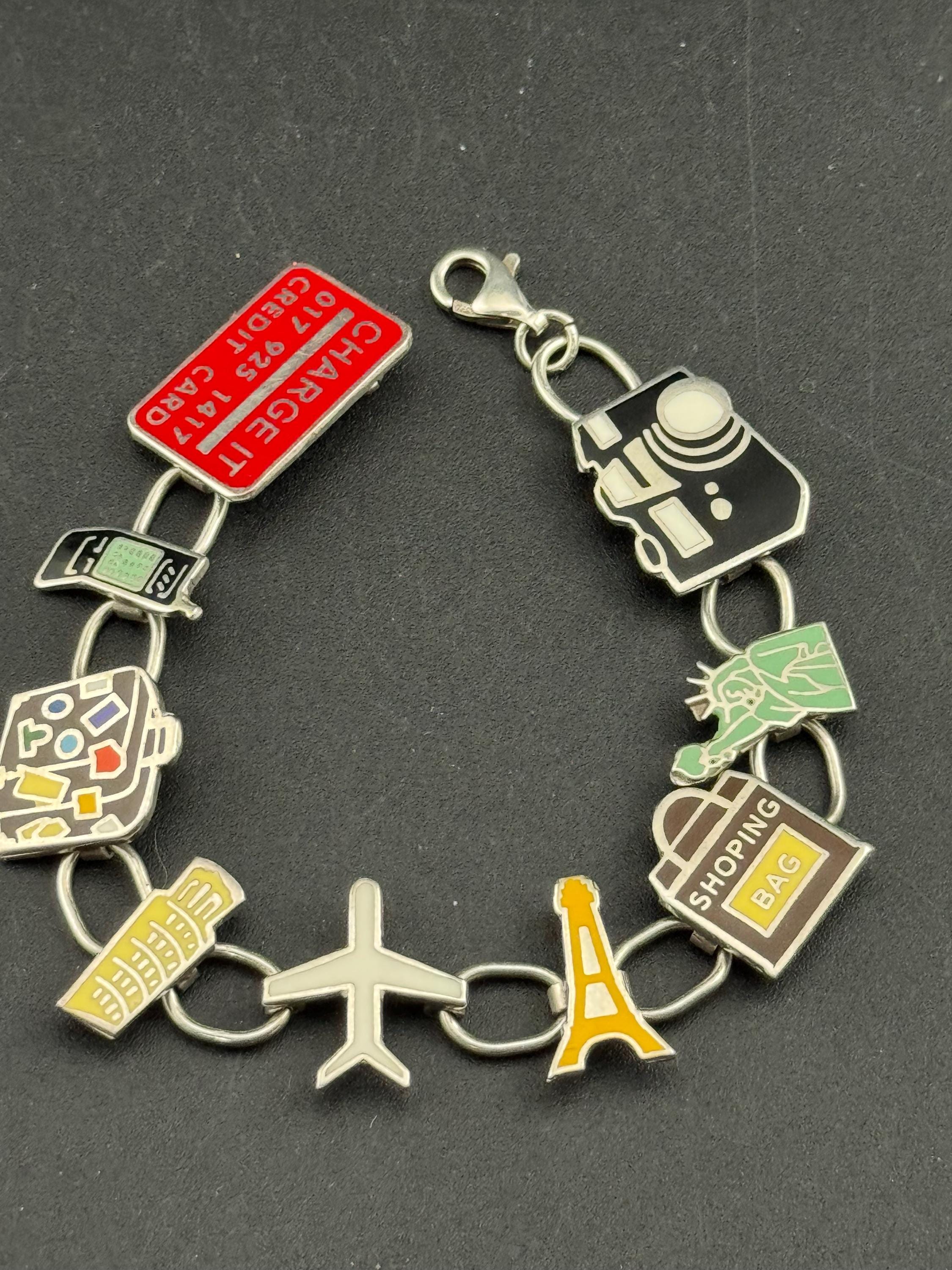Quirky retro 925 travel themed charm bracelet, panel link in sterling silver