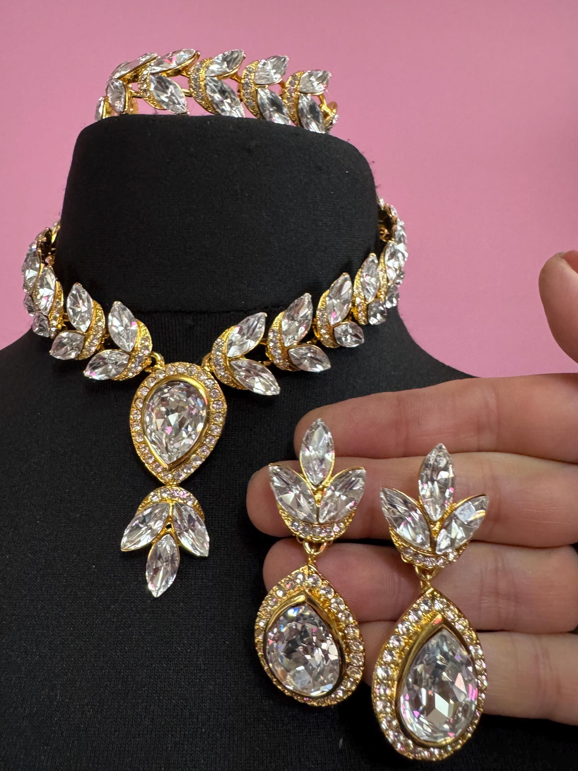 Vintage clear Swarovski crystal jewellery set, necklace,bracelet and clip on earrings.