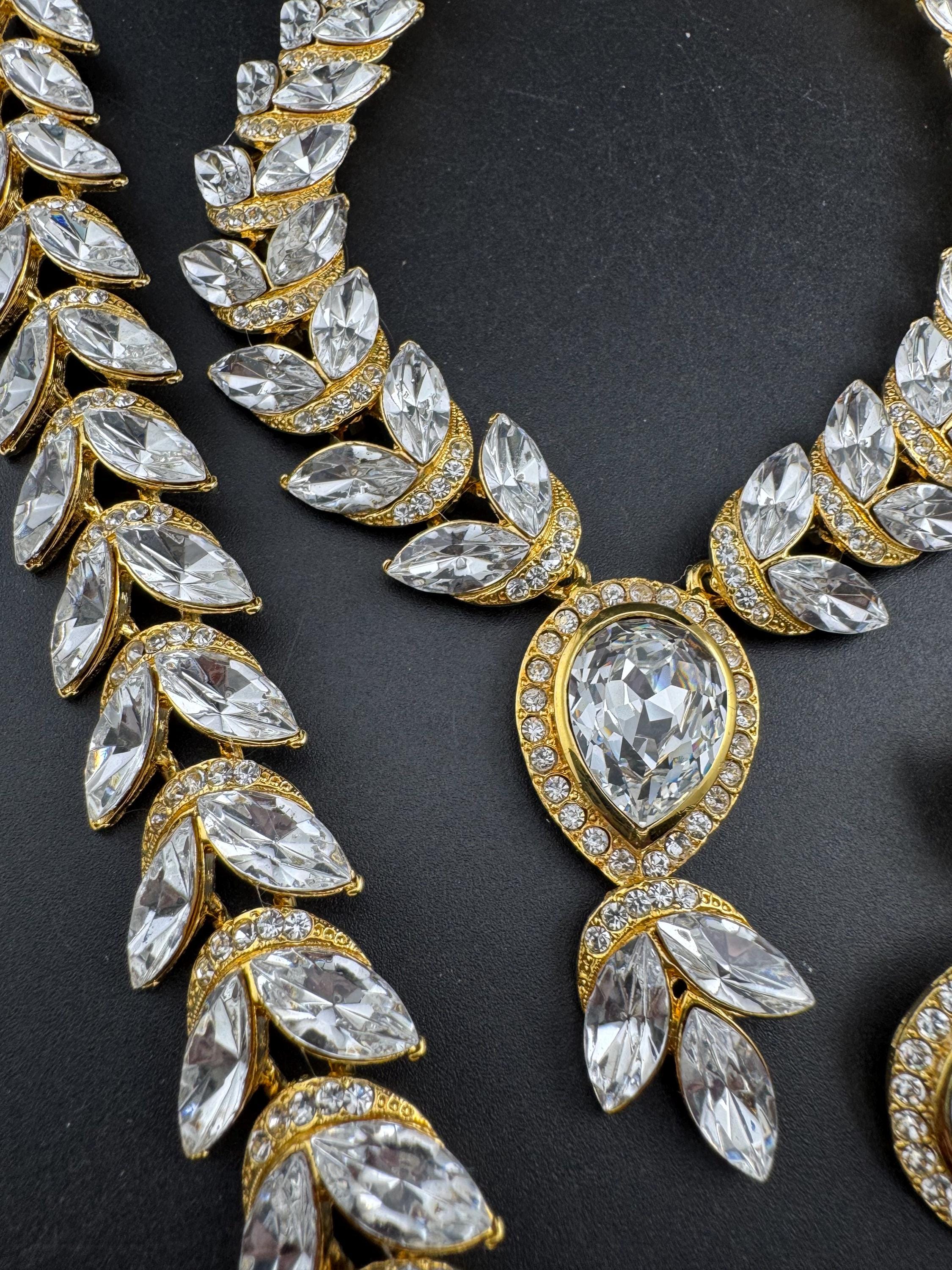 Vintage clear Swarovski crystal jewellery set, necklace,bracelet and clip on earrings.