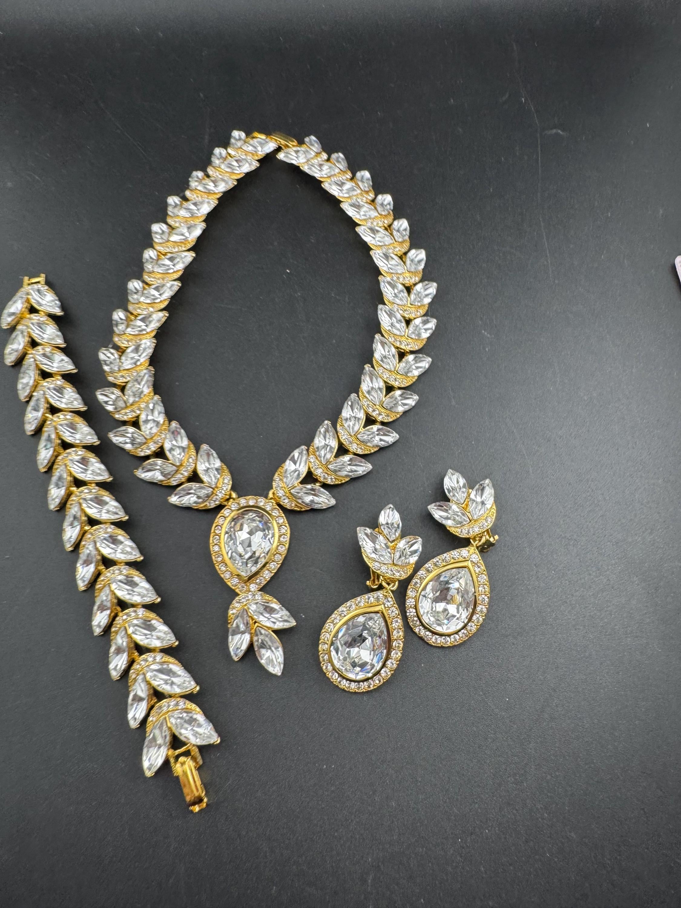 Vintage clear Swarovski crystal jewellery set, necklace,bracelet and clip on earrings.