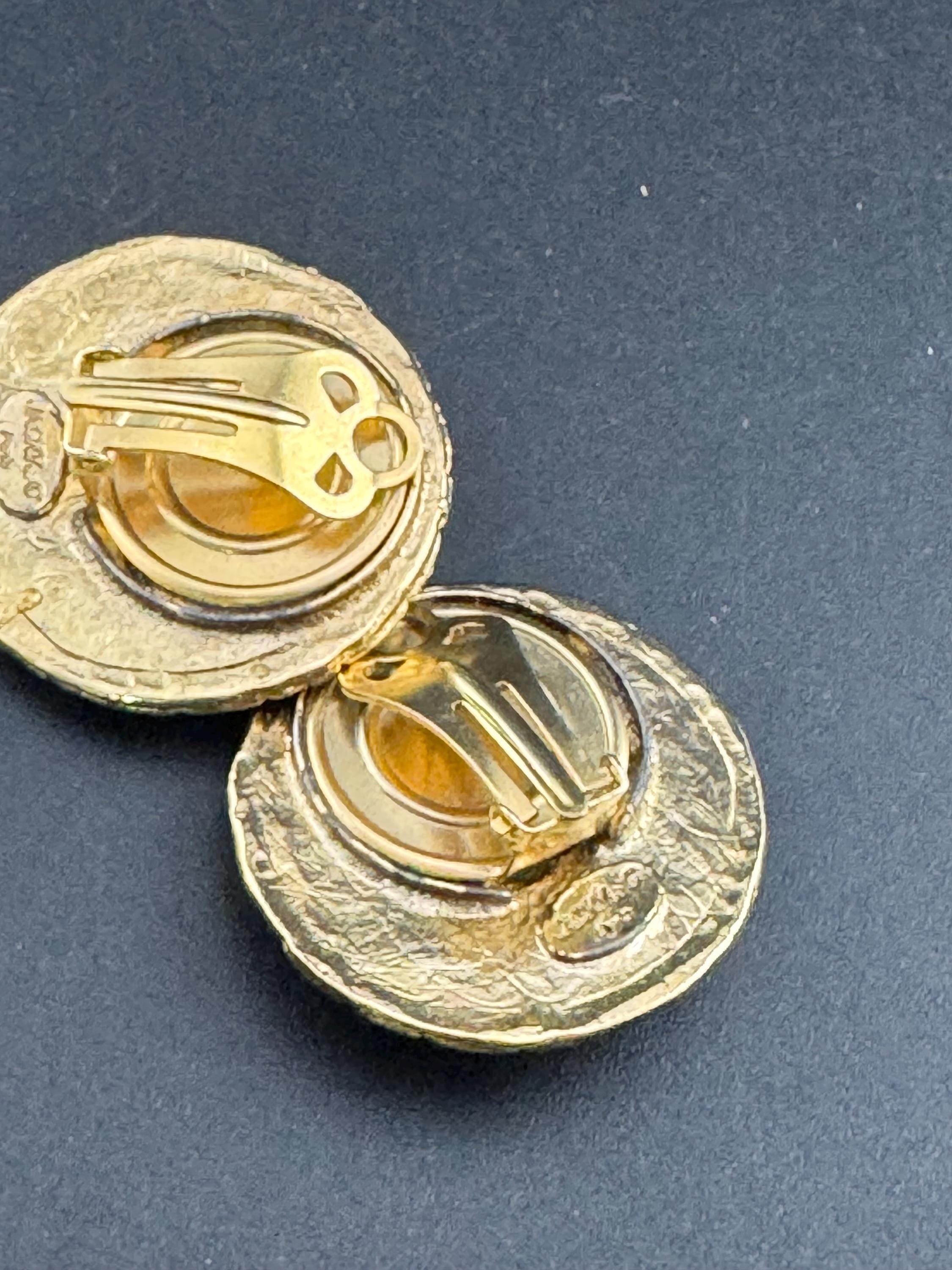 Jacky de G big gold disc Clip On Earrings: Oversized designer studs