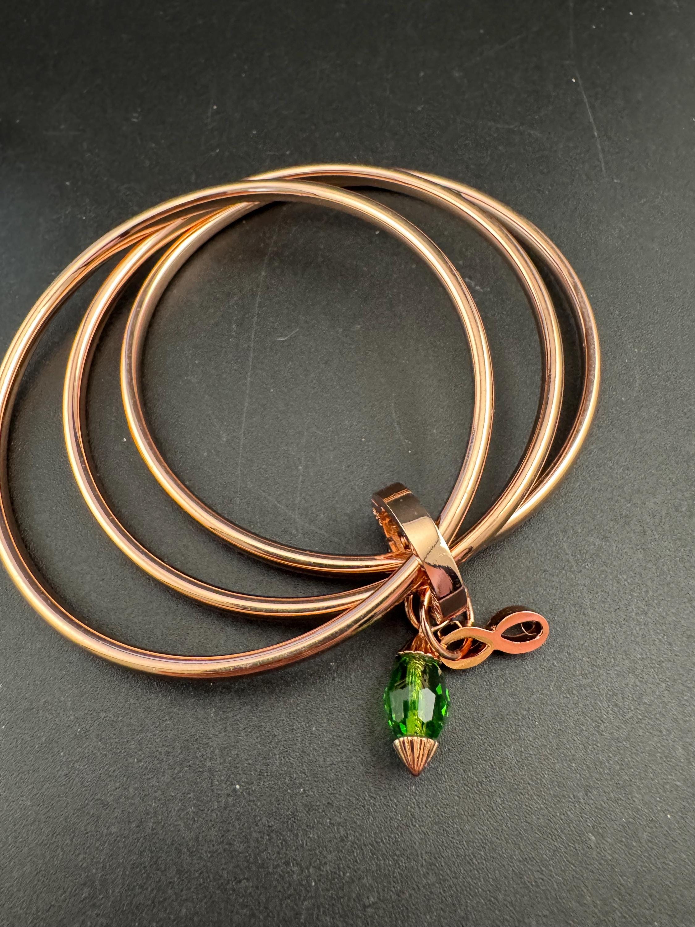 NEWBRIDGE triple rose gold plated birthstone bangles,  May birthday emerald beads