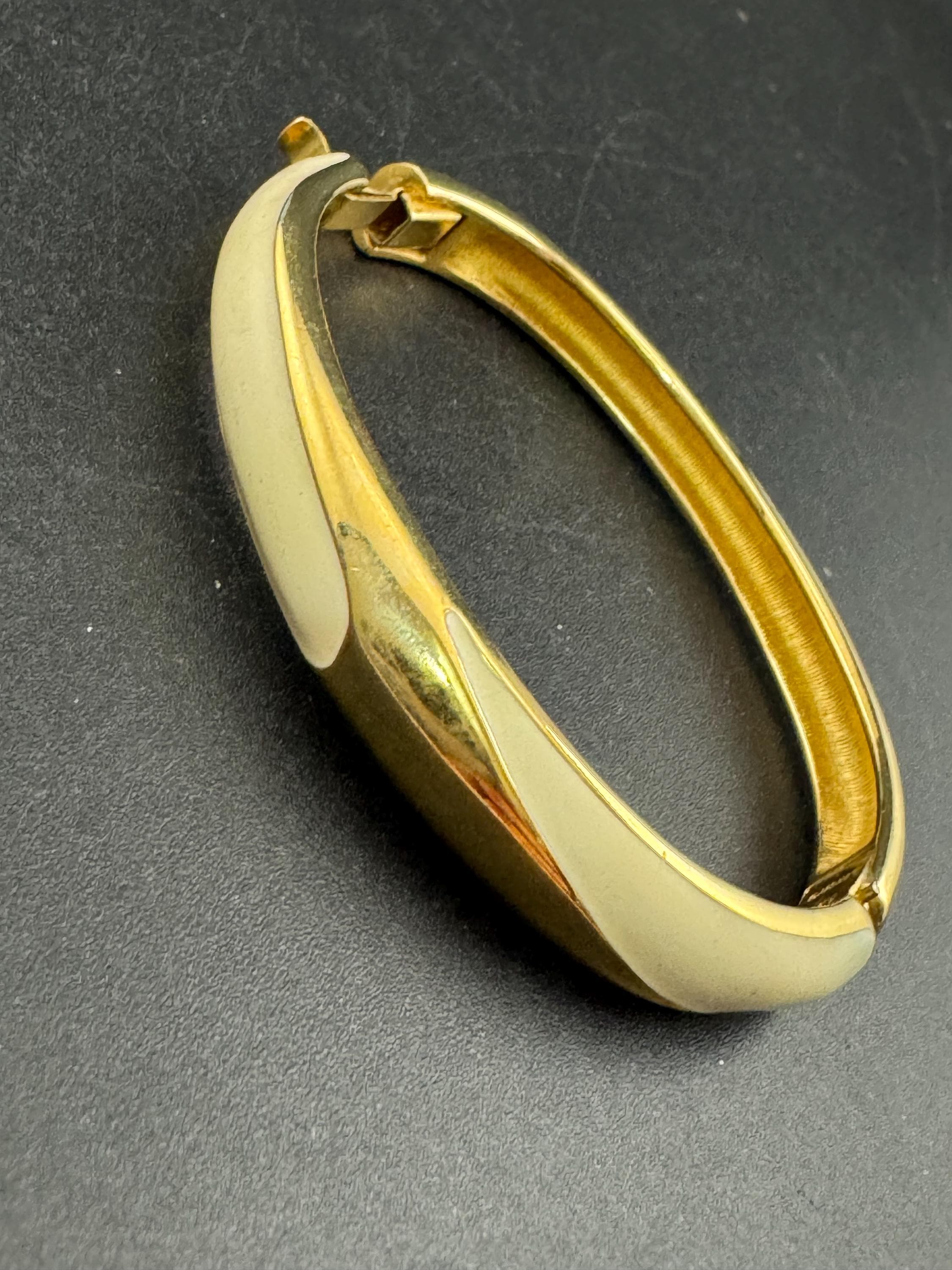 MONET signed cream enamel gold bangle bracelet, hinged clamper