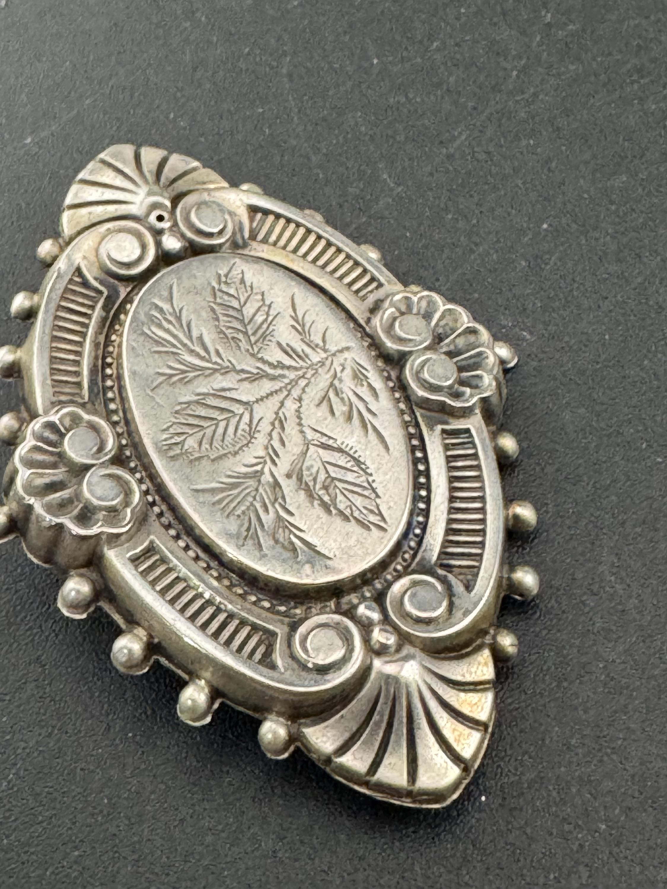 Victorian white metal oval etched mourning brooch,  aesthetic period