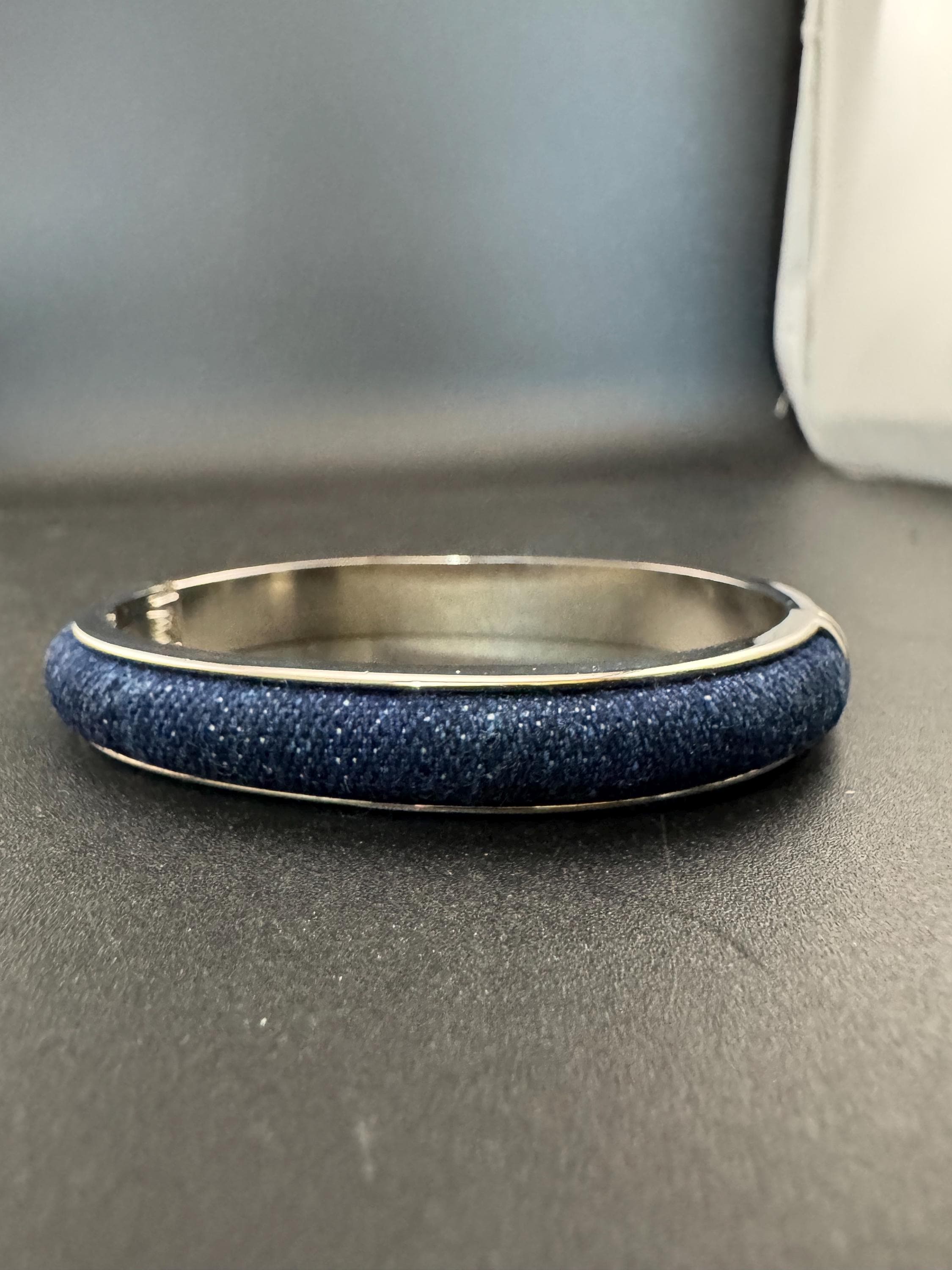 Signed Joan rivers denim blue clamper bangle: silver plated bracelet