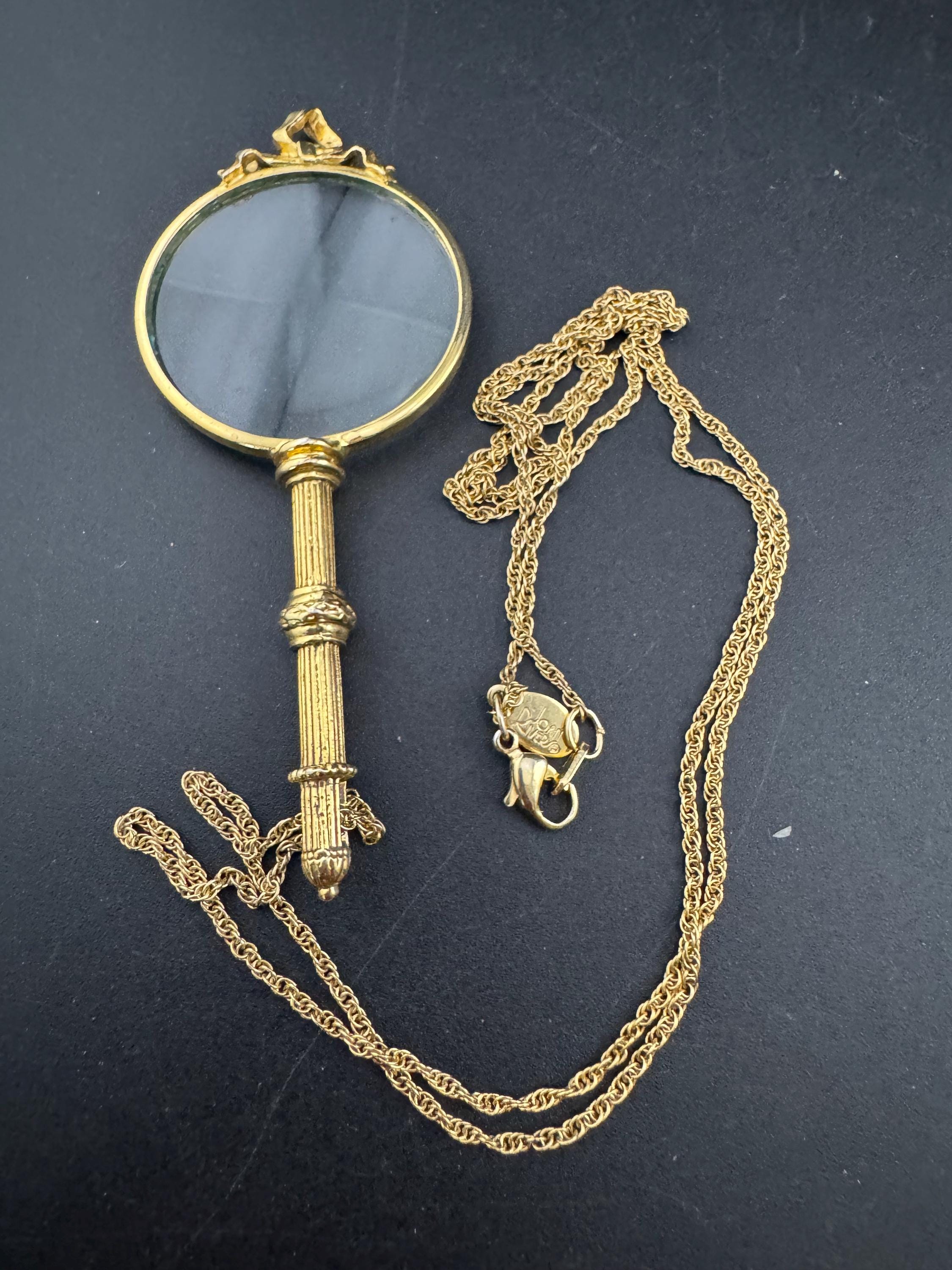 Signed Joan rivers ribbon top magnifier pendant necklace, gold plated magnifying jewellers loupe