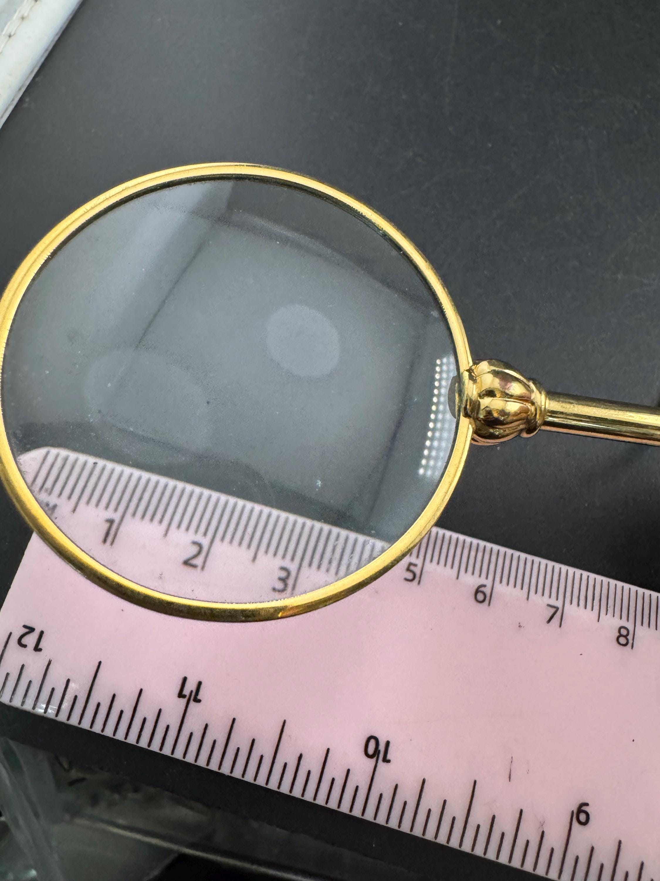 Vintage jewellers loupe eyeglass magnifier pendant necklace, gold plated with blue glass cabochon