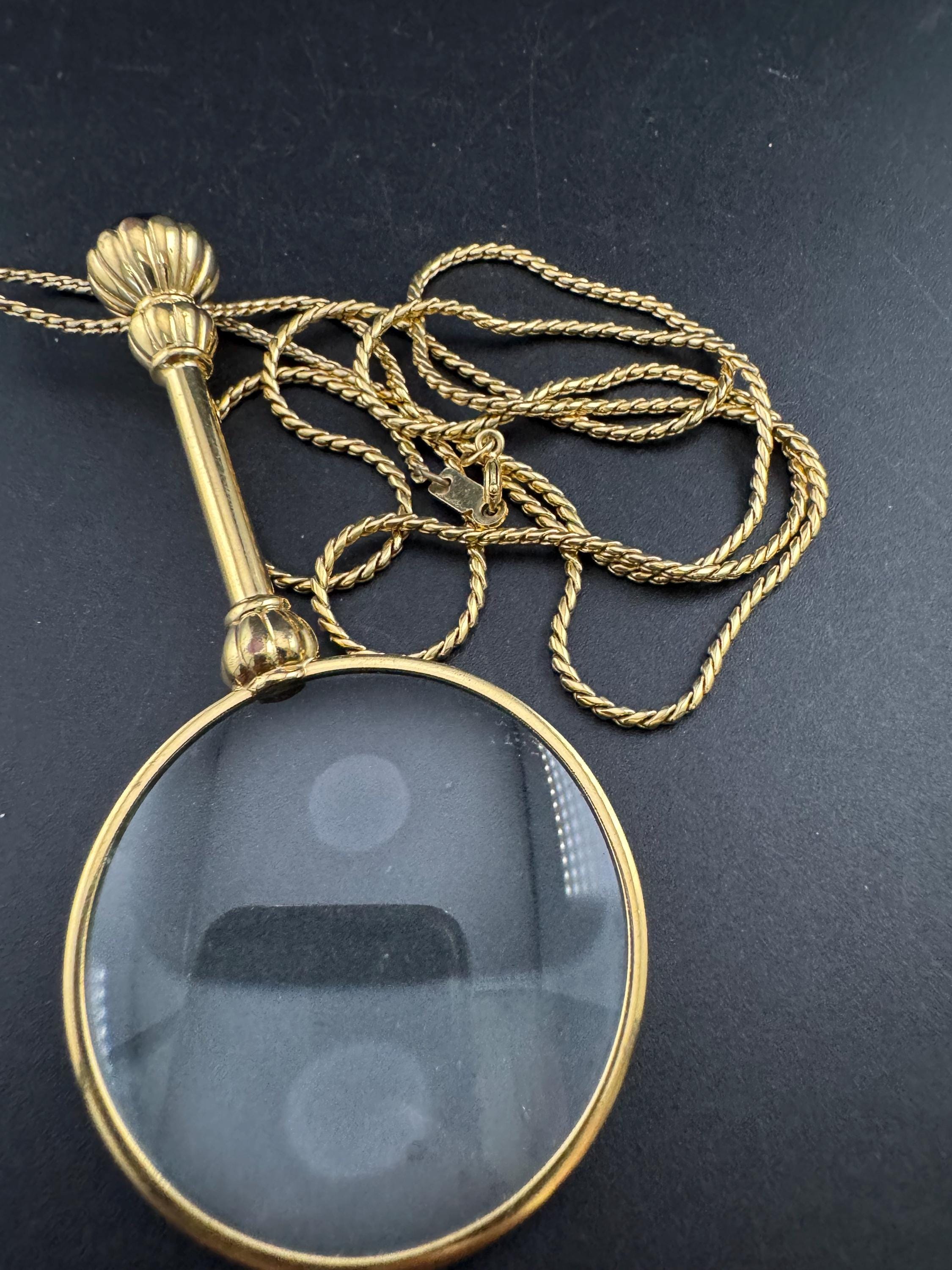 Vintage jewellers loupe eyeglass magnifier pendant necklace, gold plated with blue glass cabochon