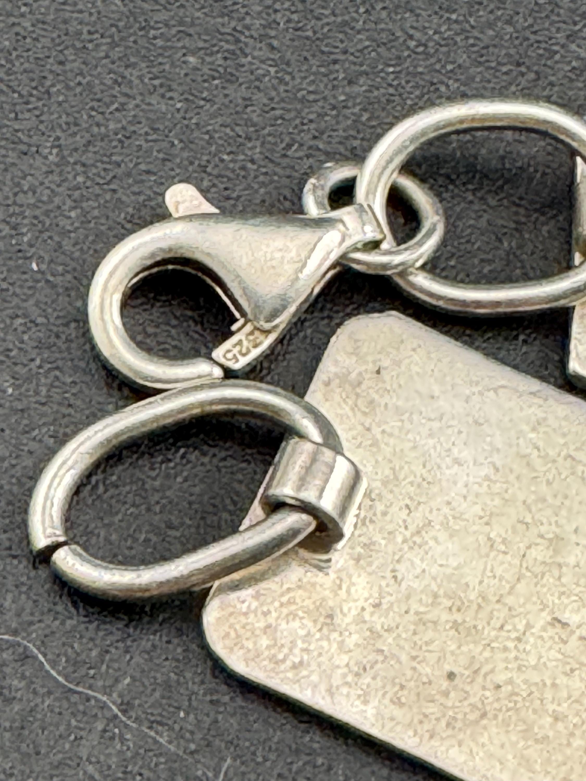 Quirky retro 925 travel themed charm bracelet, panel link in sterling silver