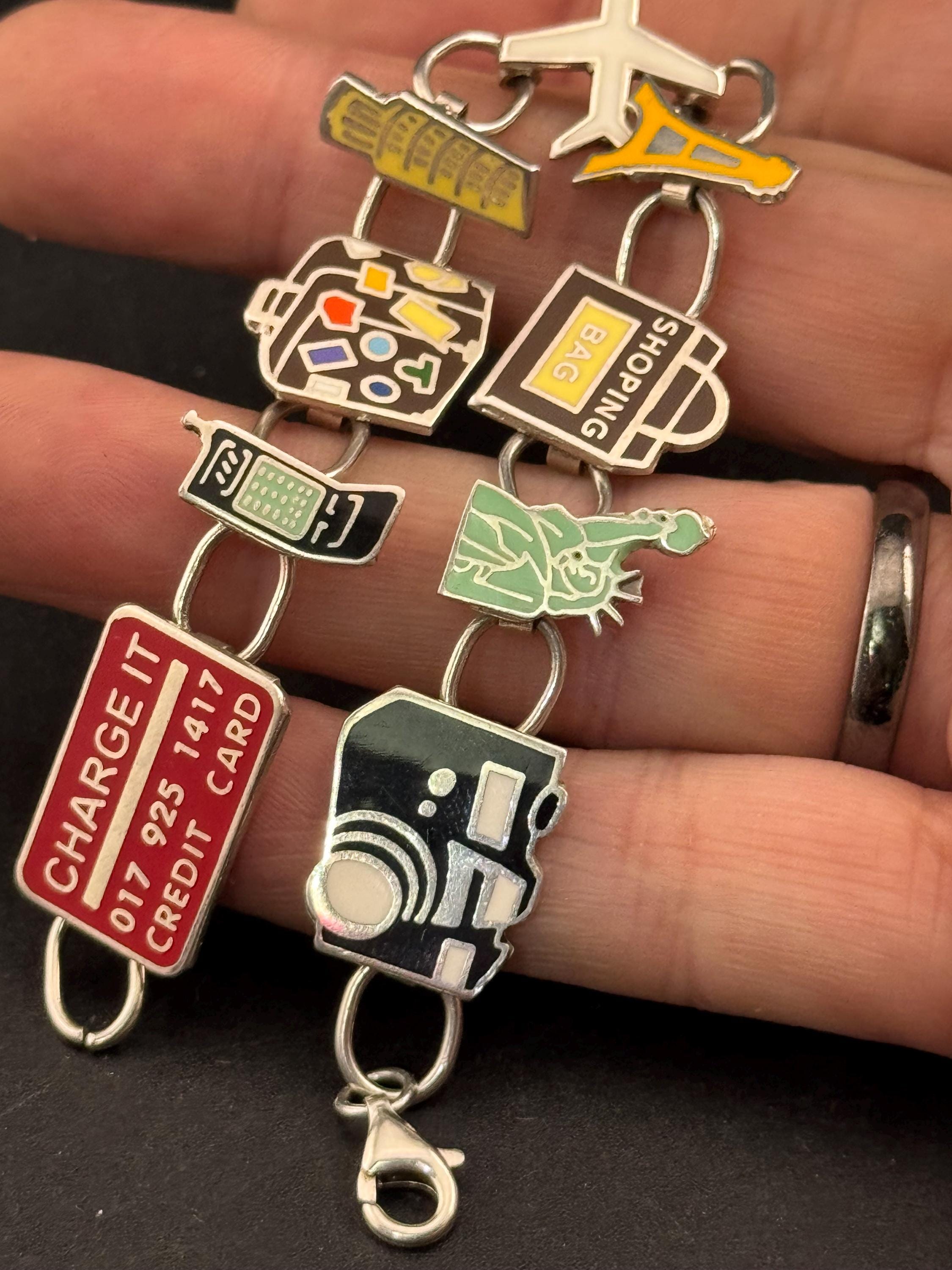 Quirky retro 925 travel themed charm bracelet, panel link in sterling silver