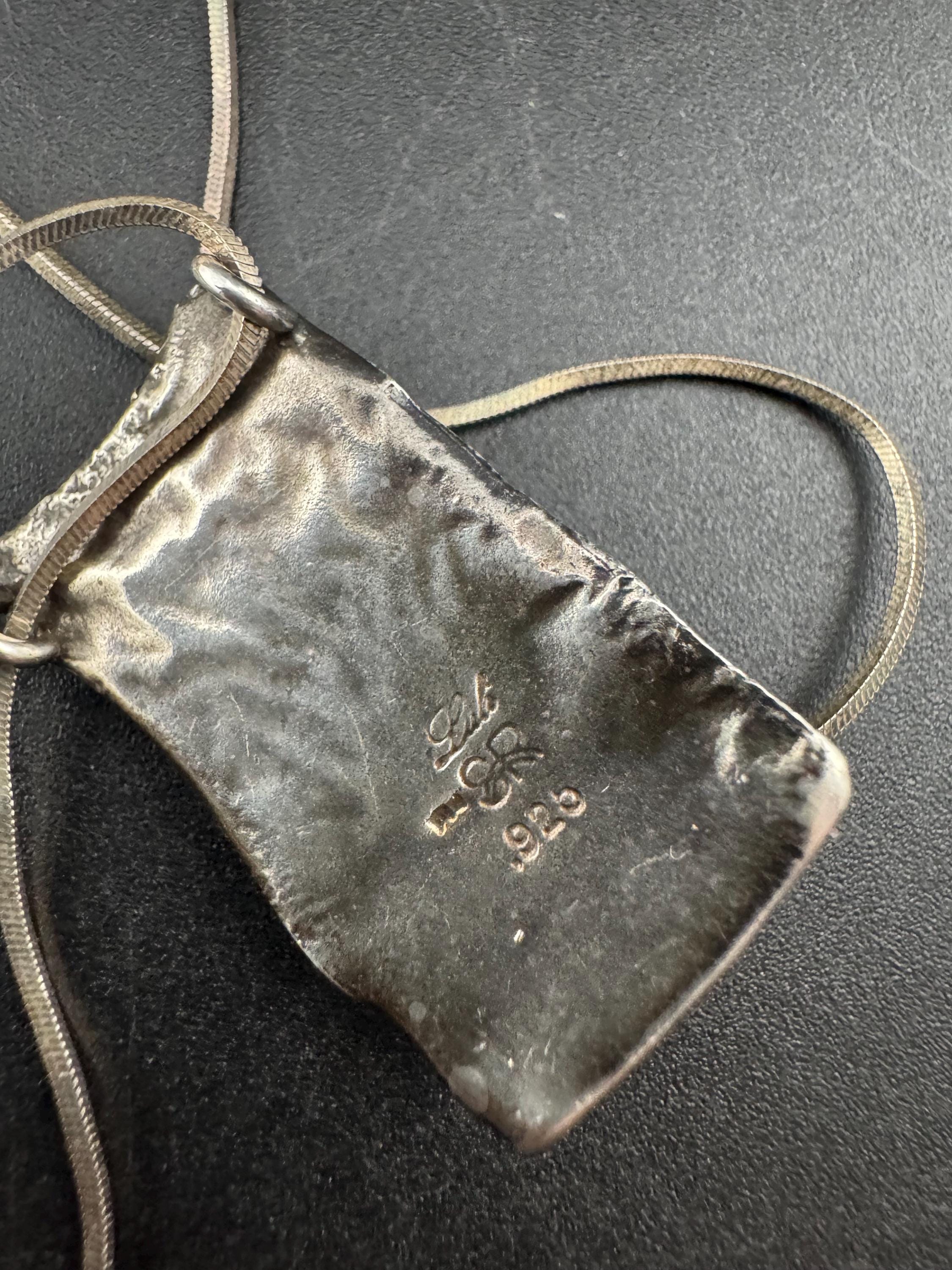 925 silver blue roman glass pendant by the artisan Luli Hamersztein.