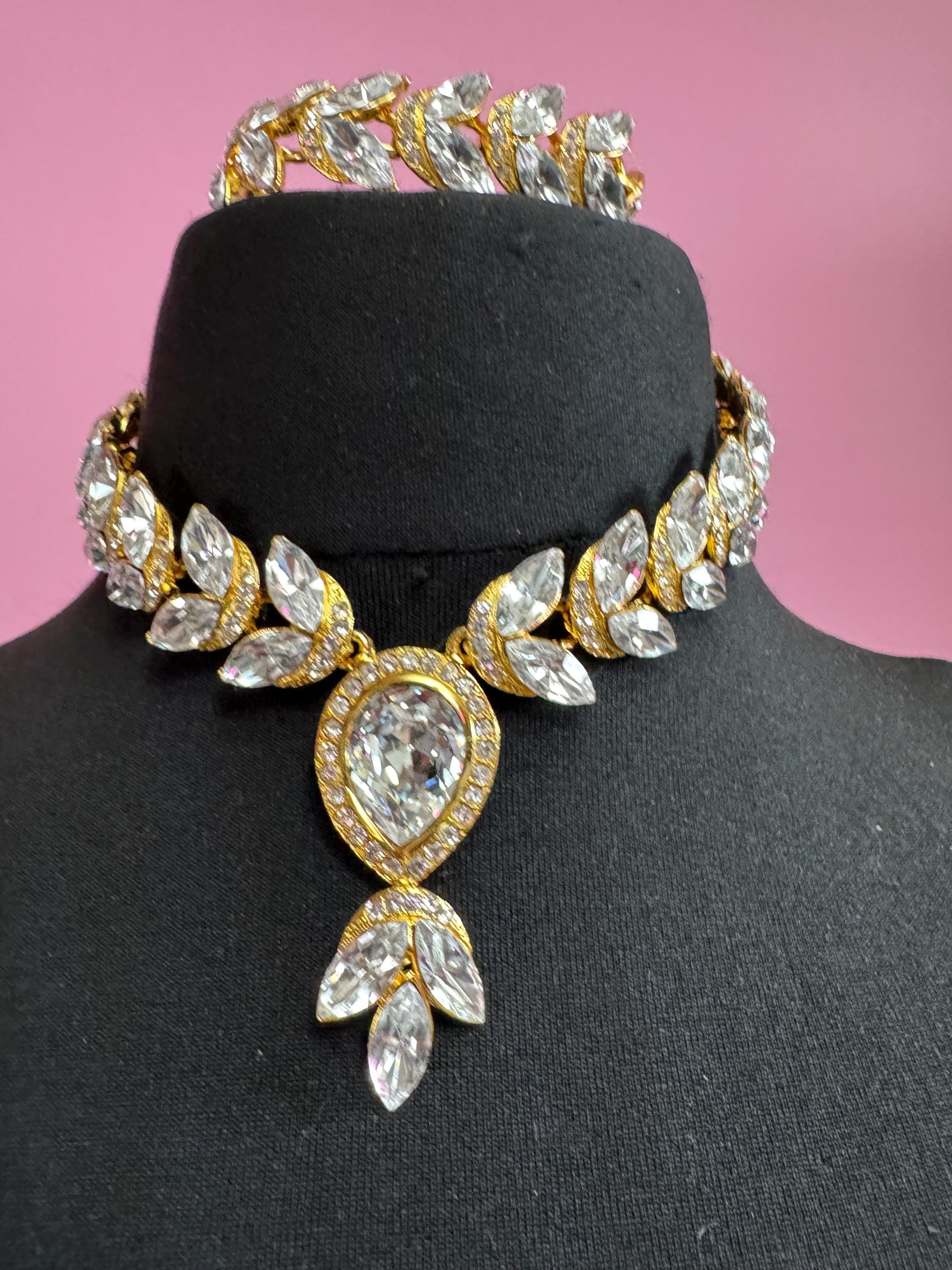 Vintage clear Swarovski crystal jewellery set, necklace,bracelet and clip on earrings.