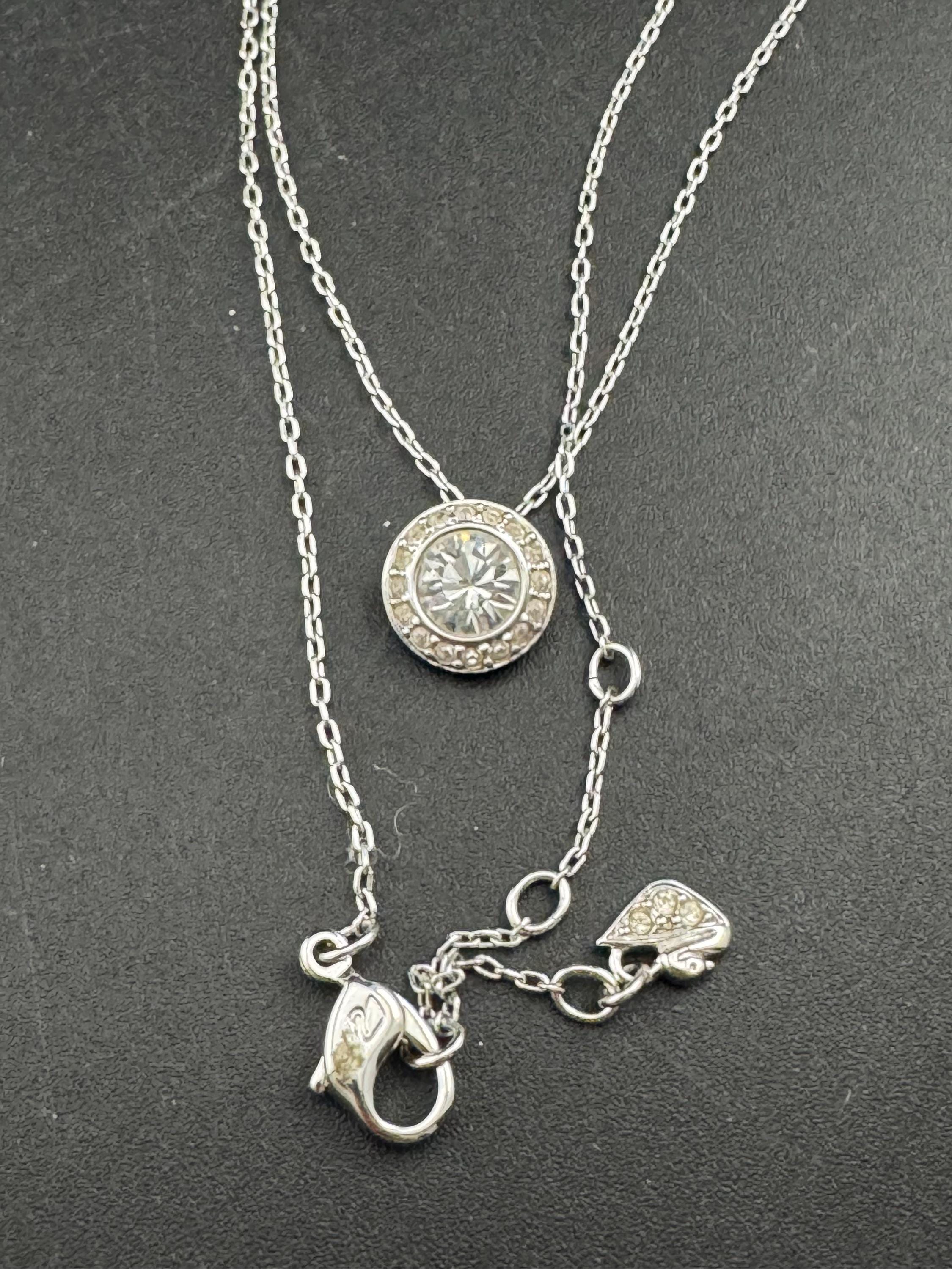 Signed Swarovski crystal angelic pendant necklace,  Rhodium plated