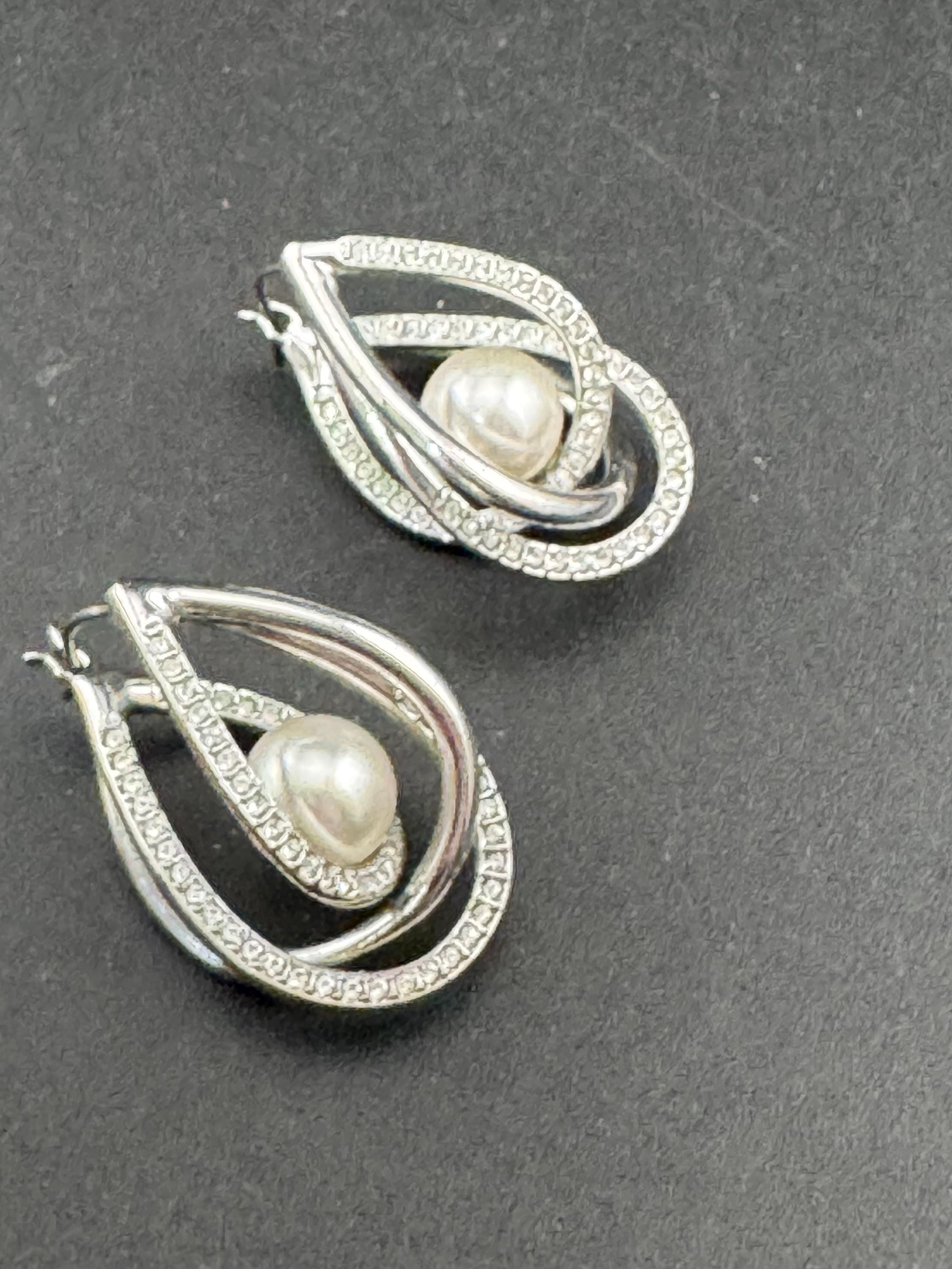 Swarovski crystal caged pearl pierced earrings, Signed swan rhodium plated
