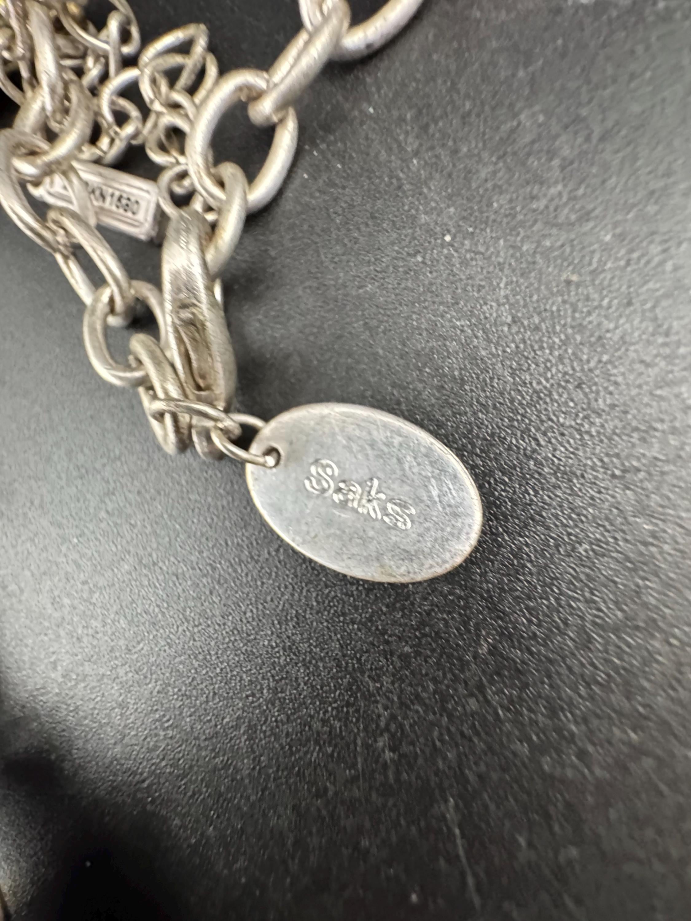 Vintage SAKS silver and brass brutalist melted metal panel link choker necklace