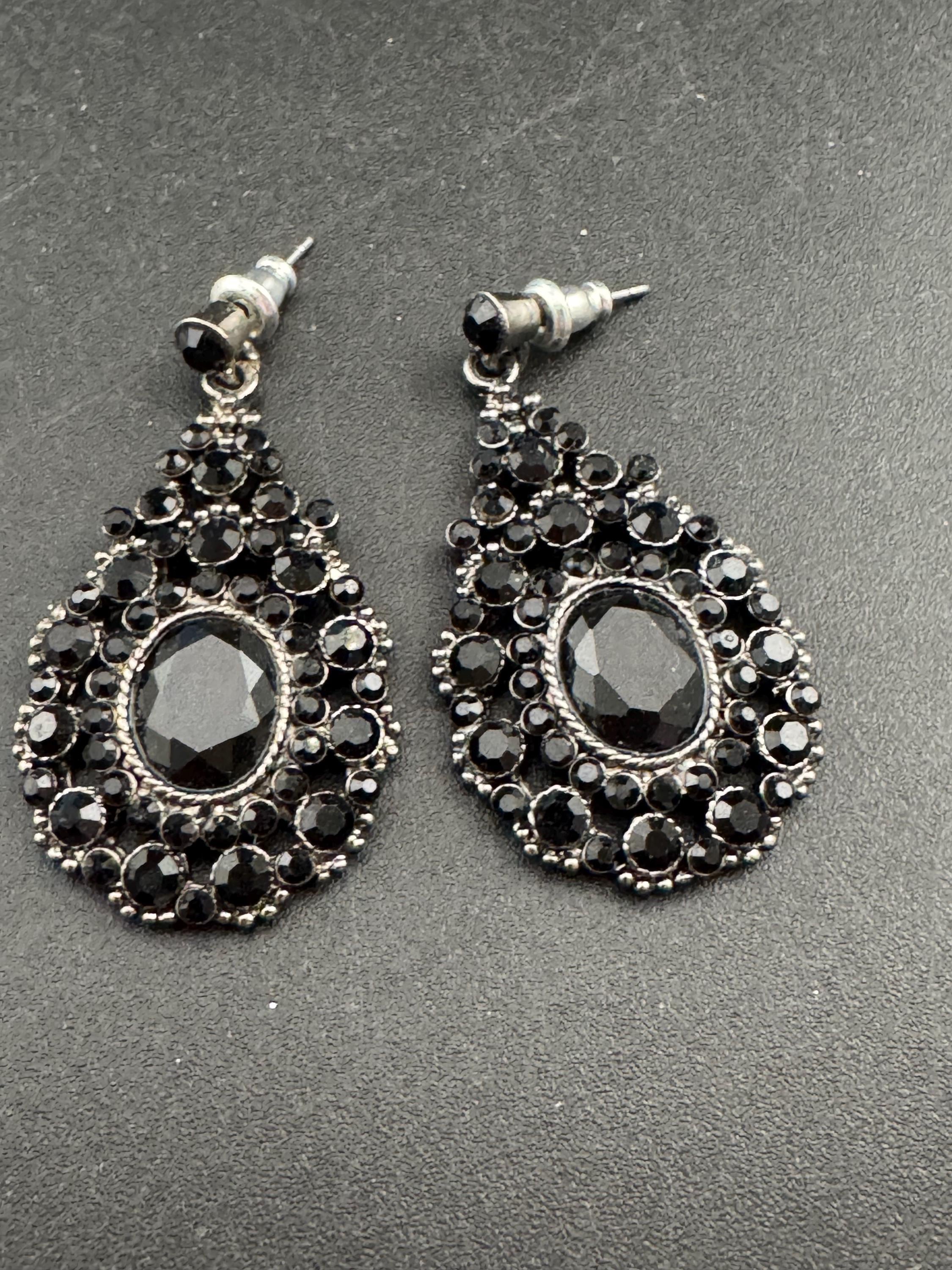 Signed MONET black rhinestone teardrop earrings, pierced dark silver tone