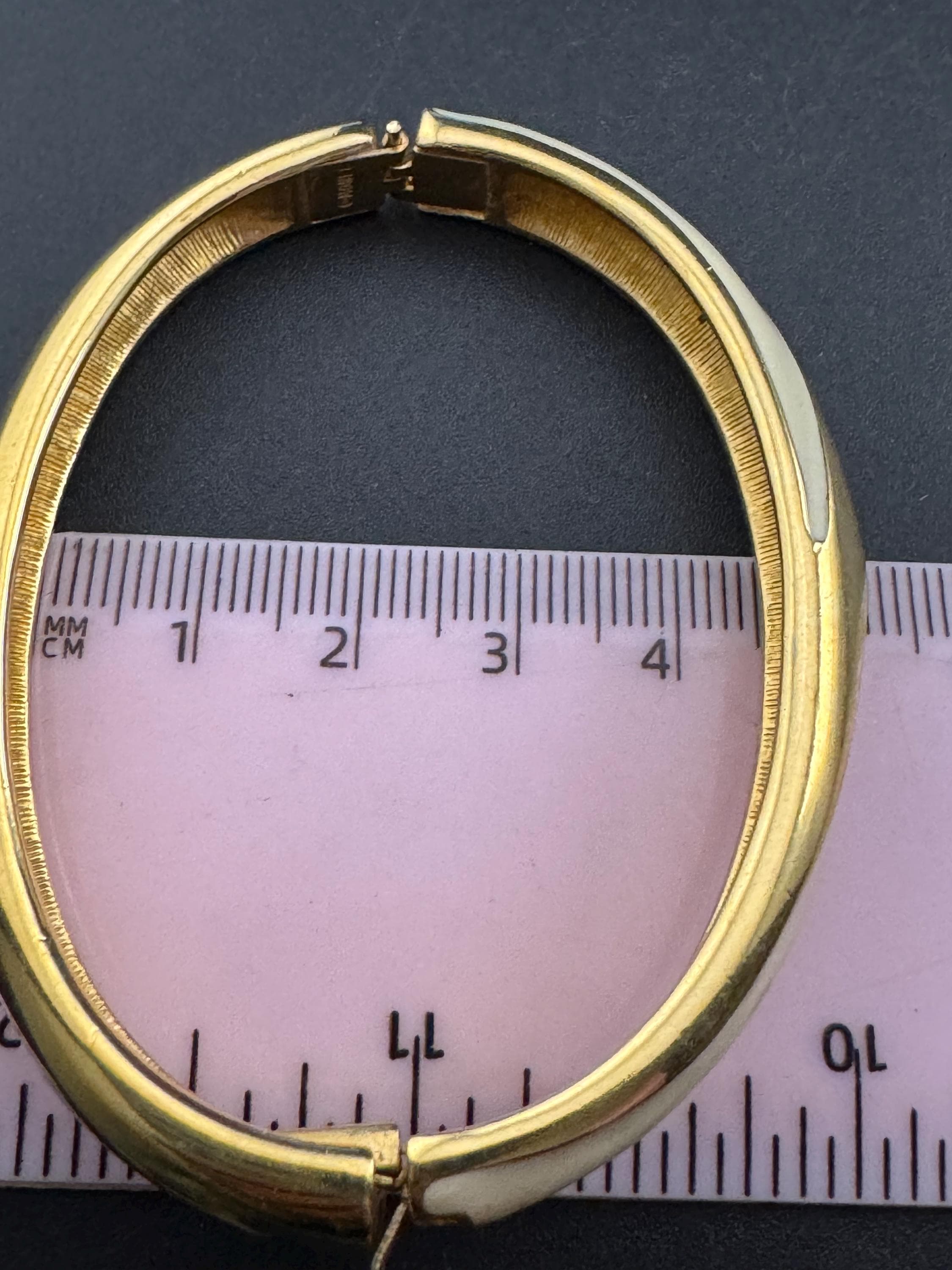 MONET signed cream enamel gold bangle bracelet, hinged clamper