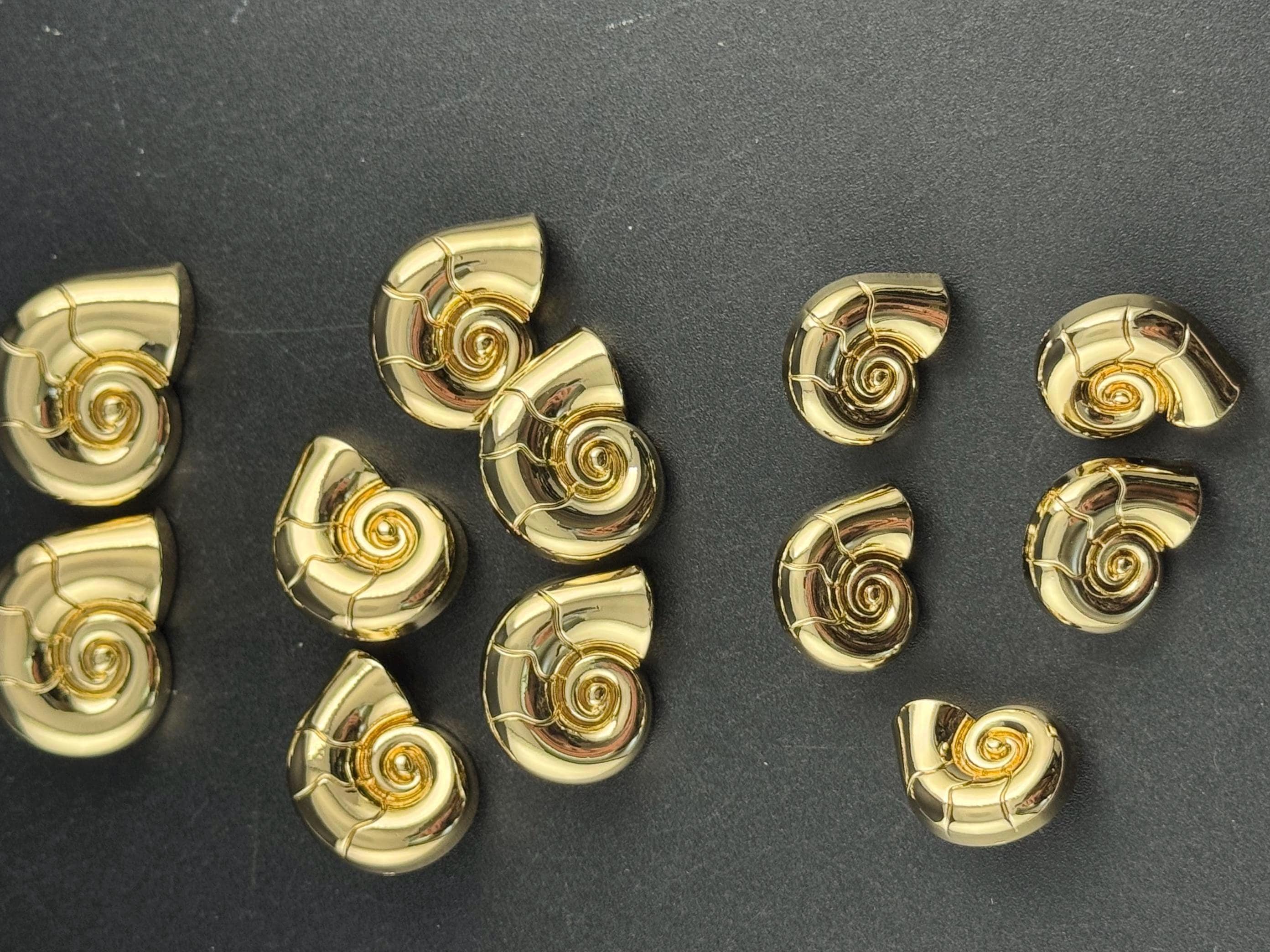 Gold ammonite shell sewing buttons, three sizes 30mm 23mm 20mm