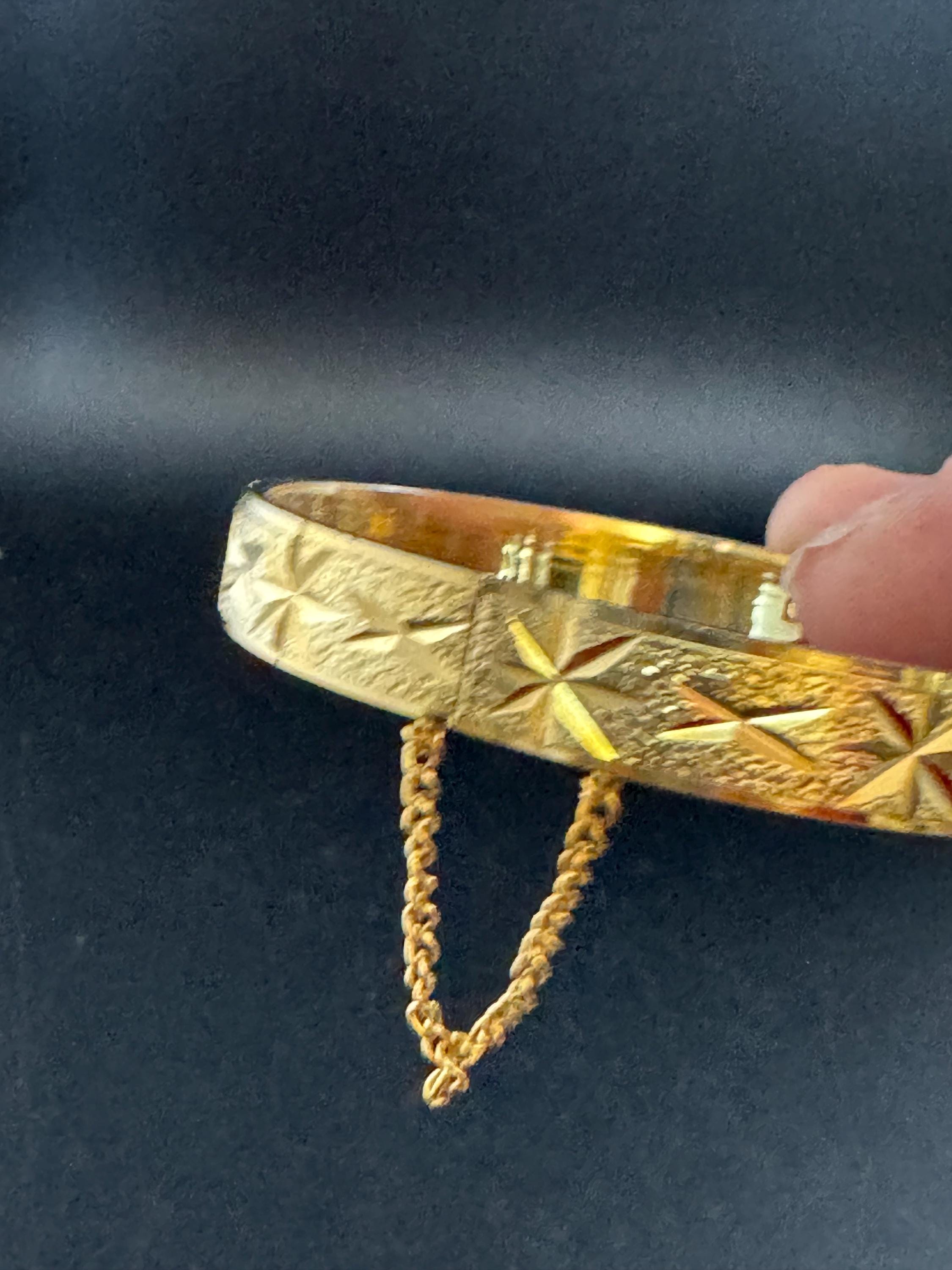 Vintage Gold plated etched Bangle, hinged 1970s with safety chain