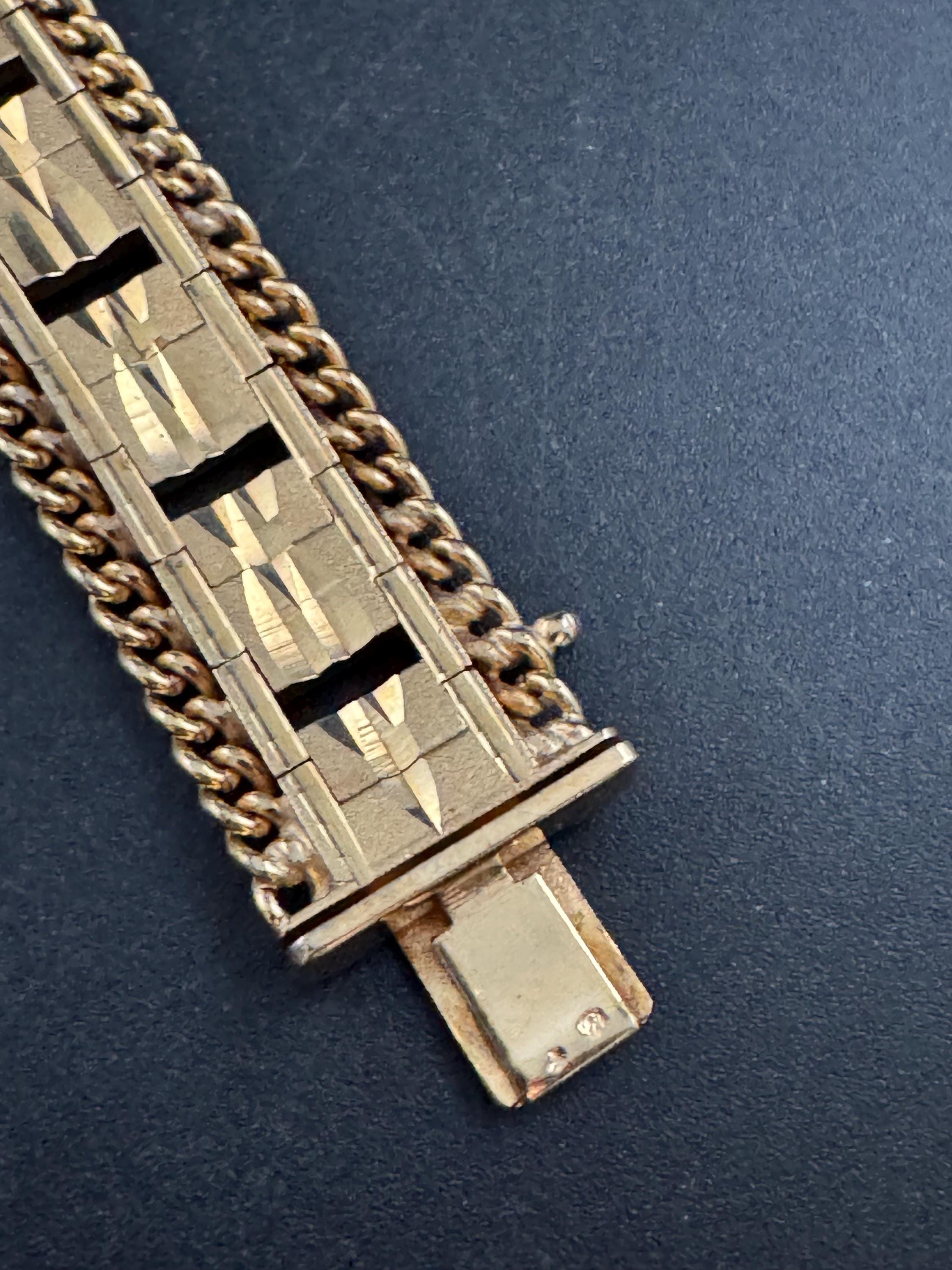 1970s flat wide etched bracelet,  gold plated chain edged openwork