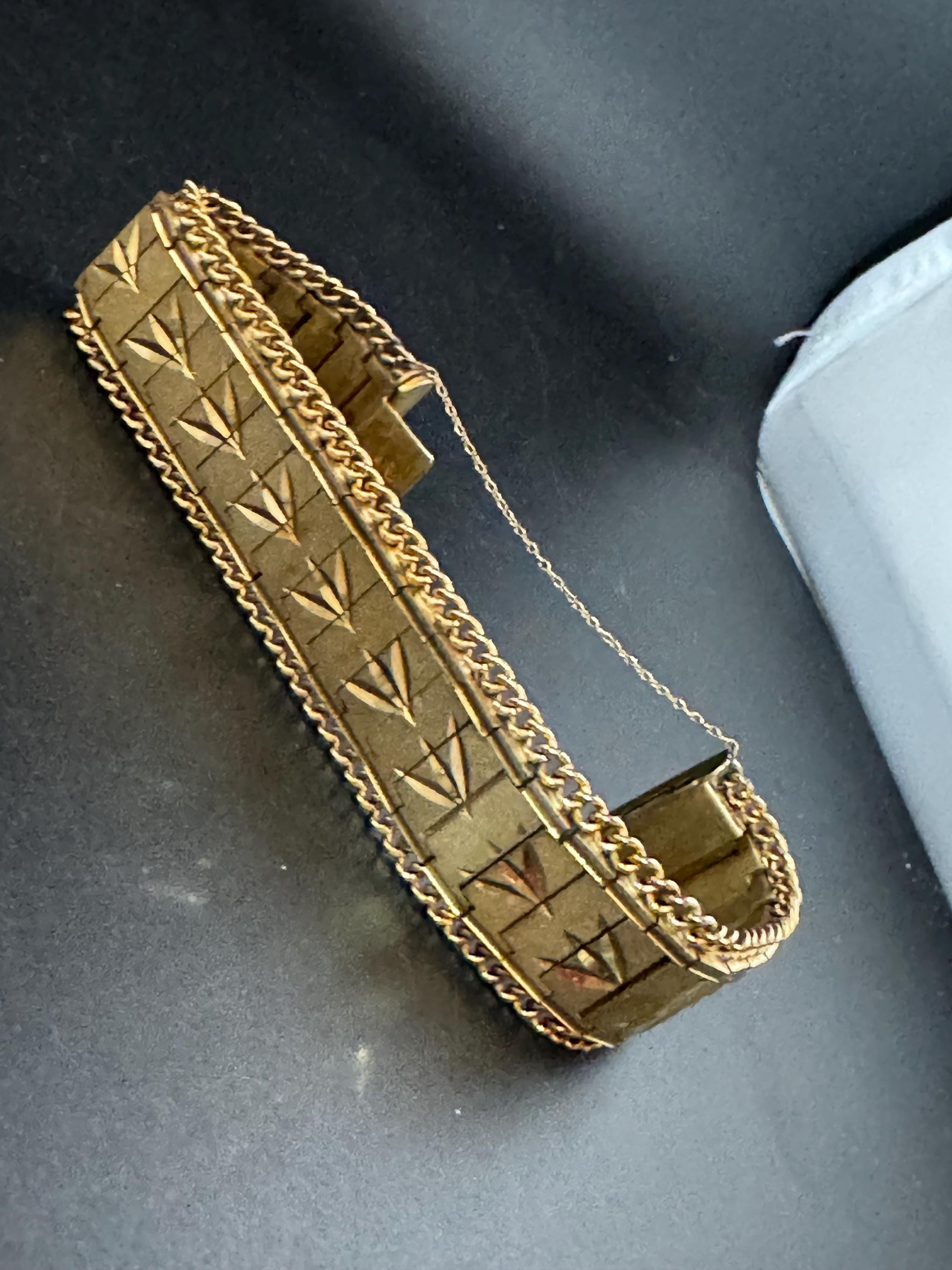 1970s flat wide etched bracelet,  gold plated chain edged with safety chain