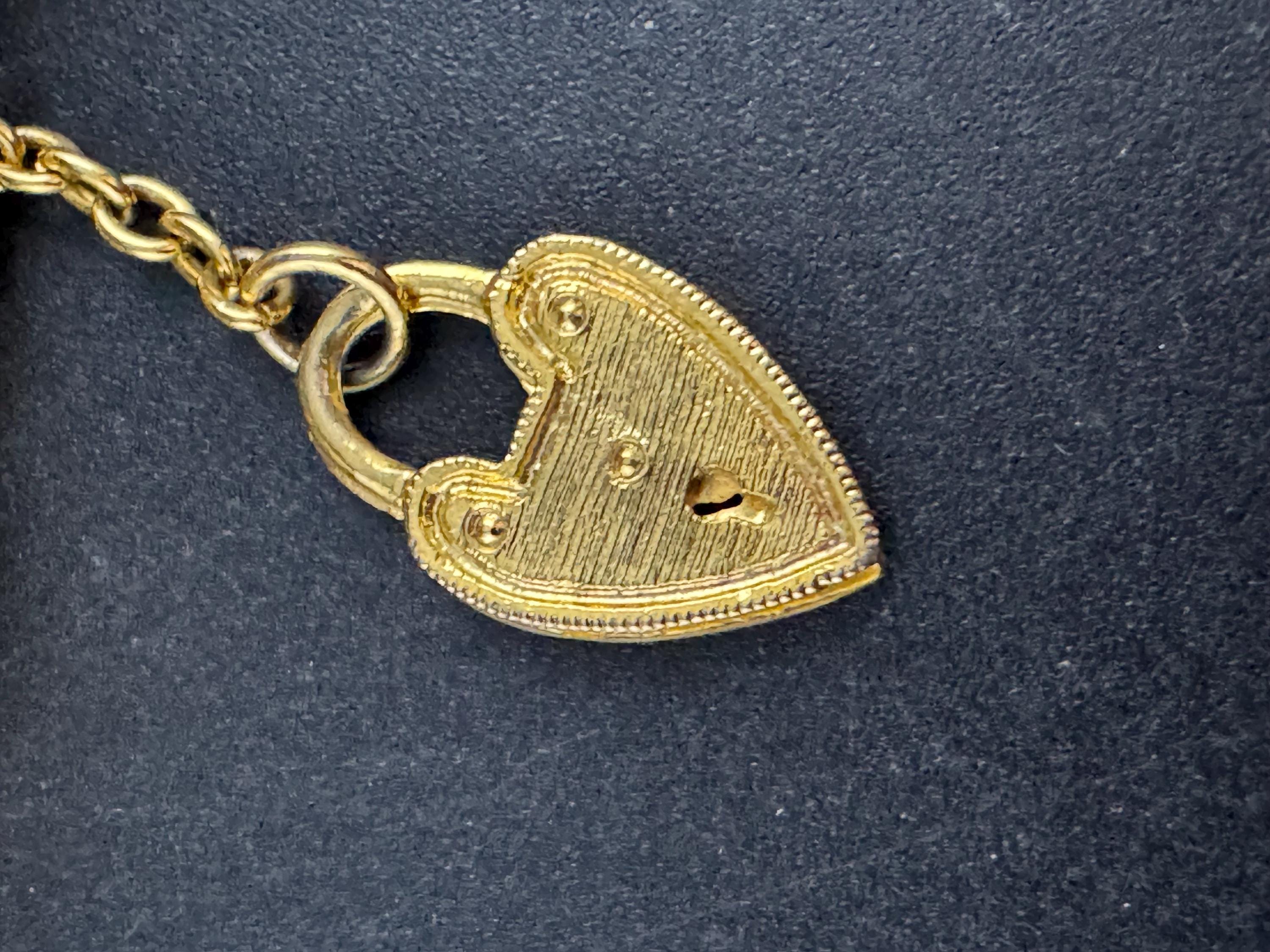 Retro 5 bar gate bracelet with heart padlock, gold tone