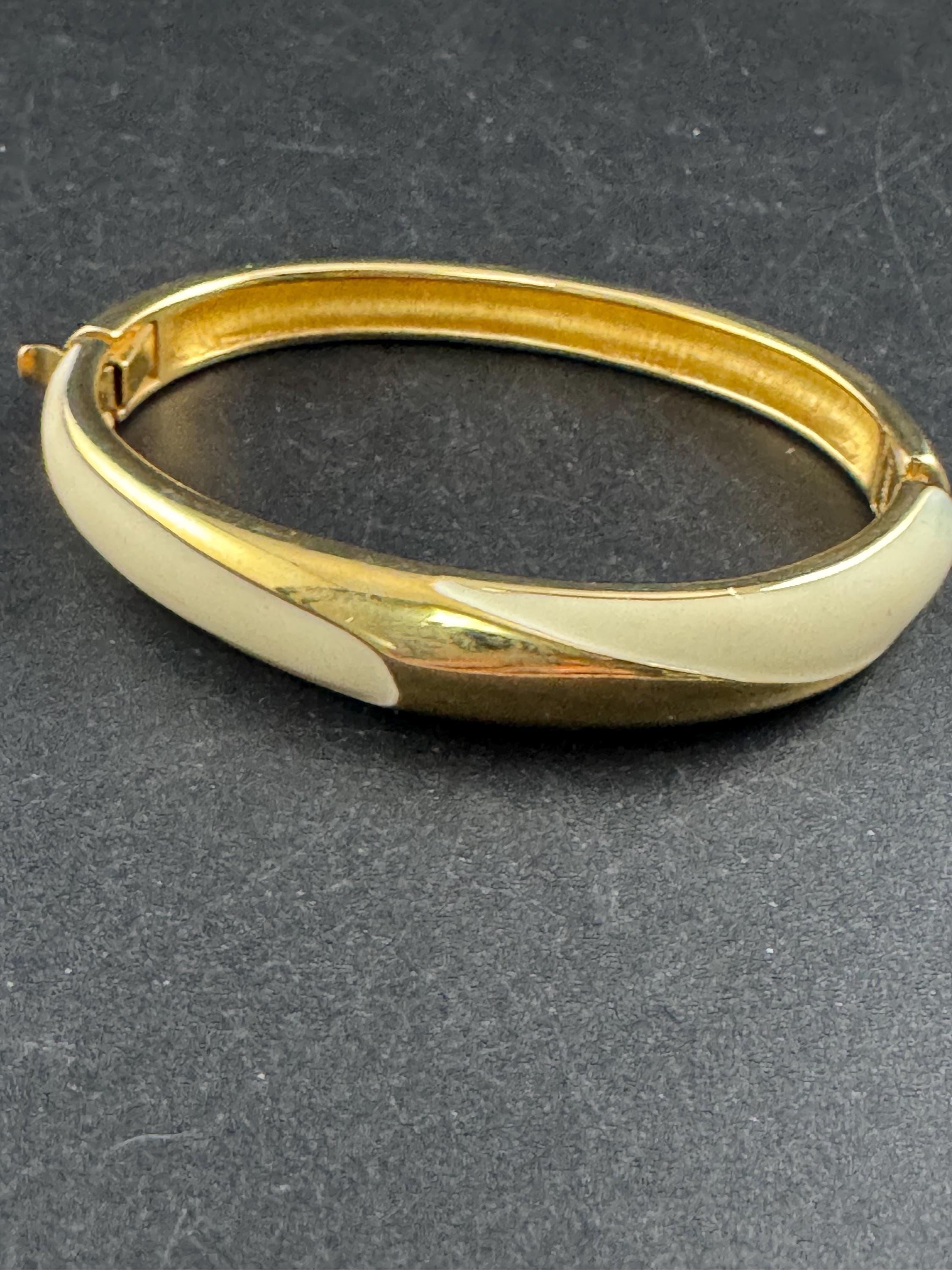 MONET cream enamel gold bangle bracelet, hinged clamper signed