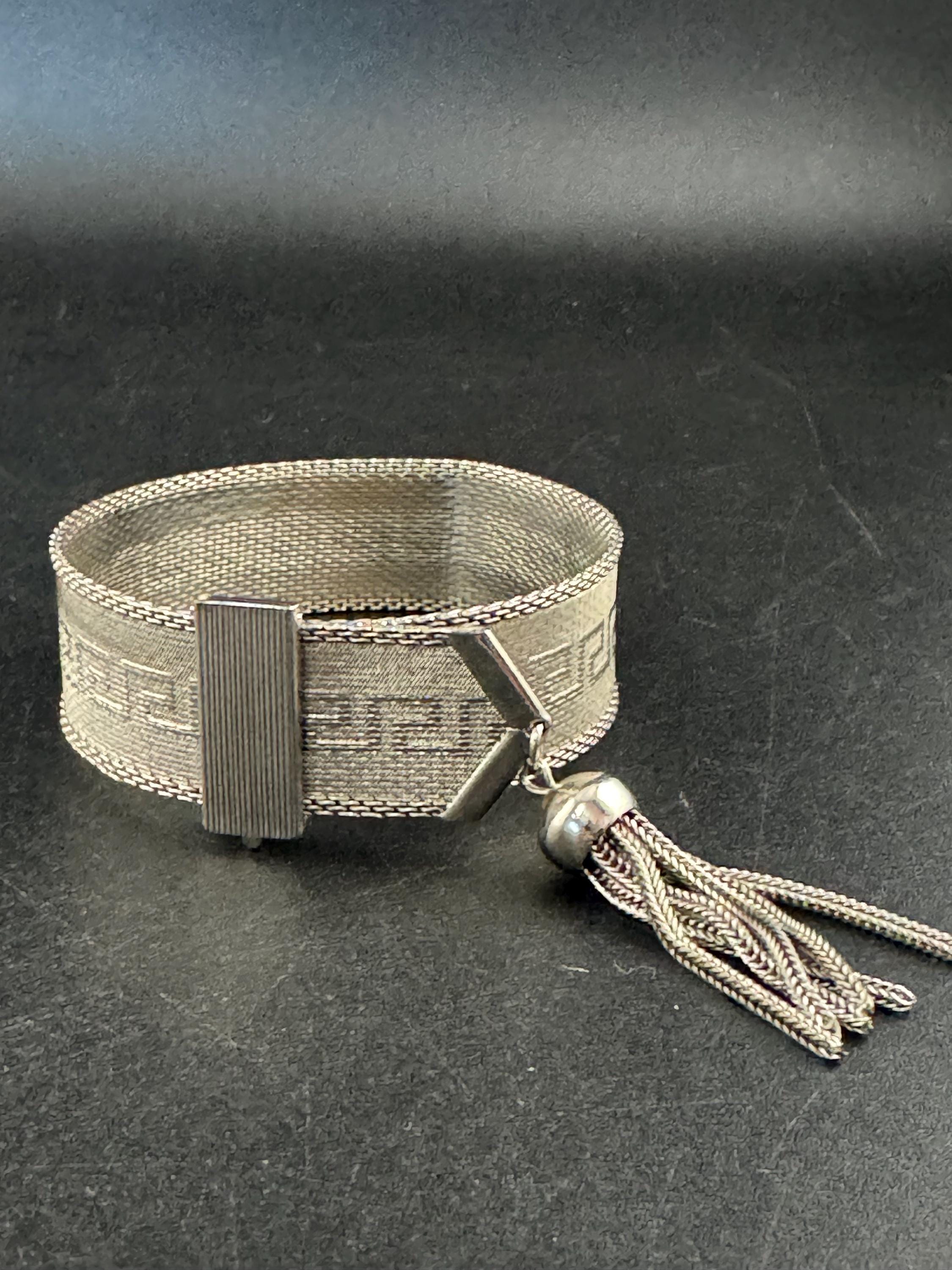 1970s GREEK KEY mesh tassel bracelet , silver plated vintage