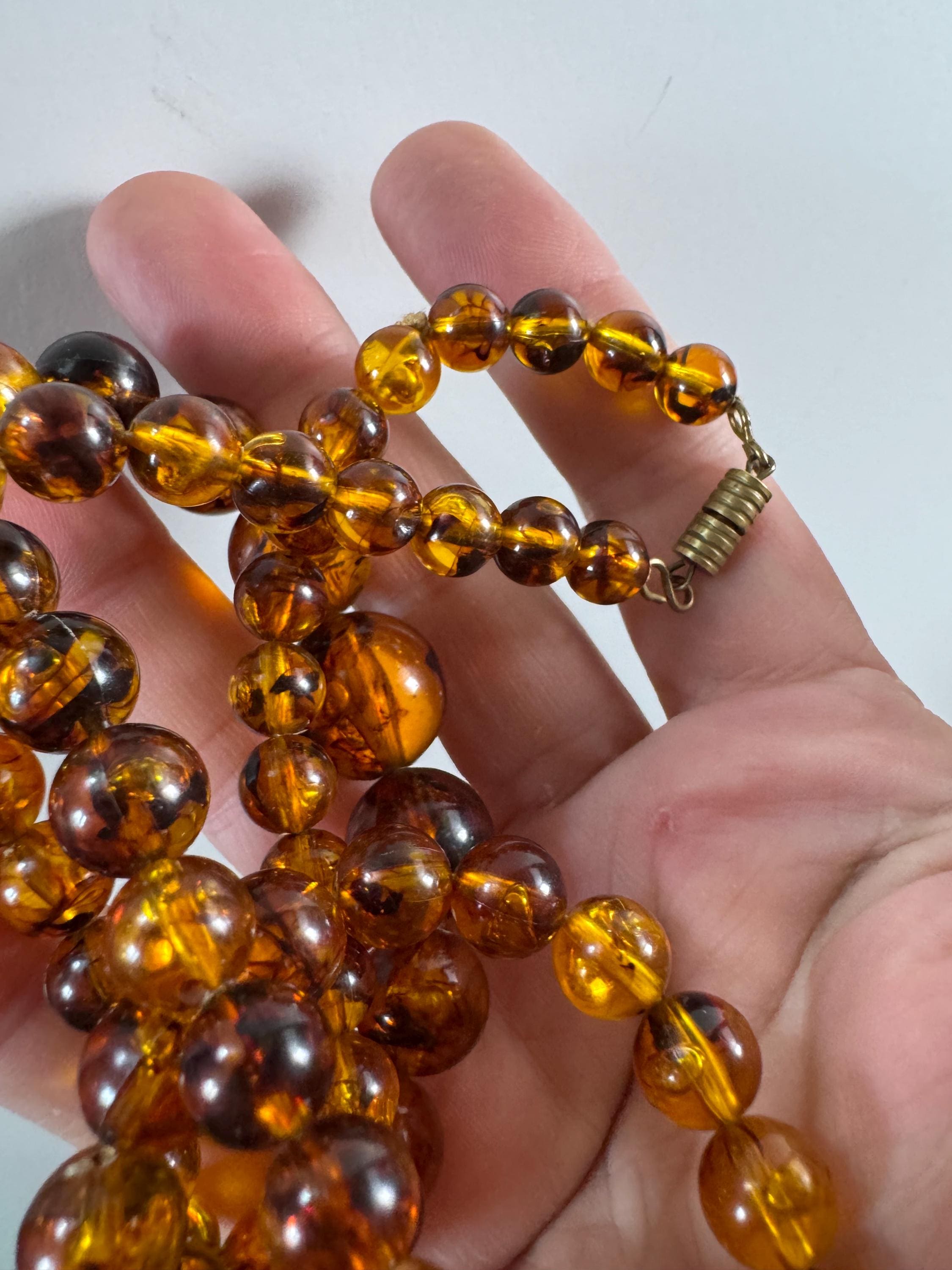 Long Faux Amber orange brown beaded necklace, plastic beads