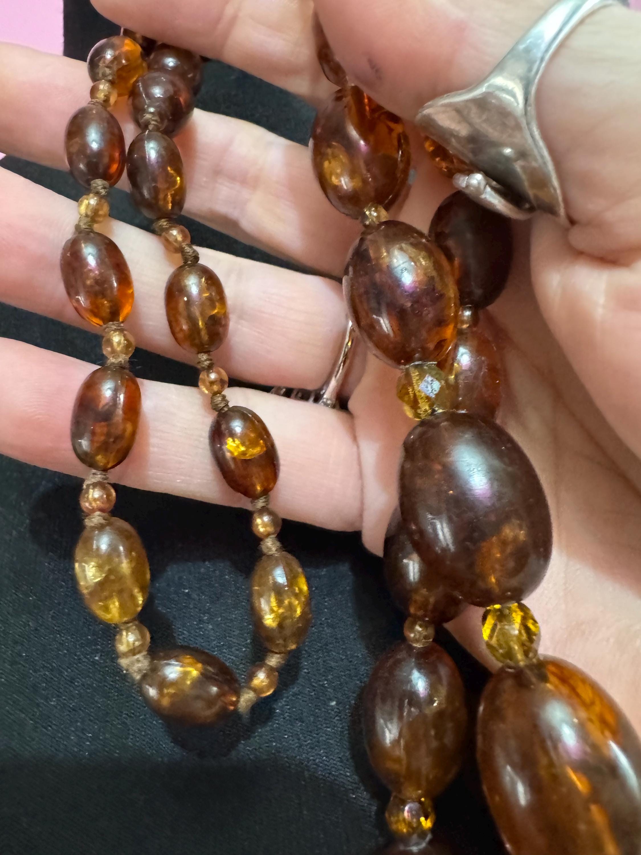 Long Faux Amber orange brown beaded necklace, oval plastic beads