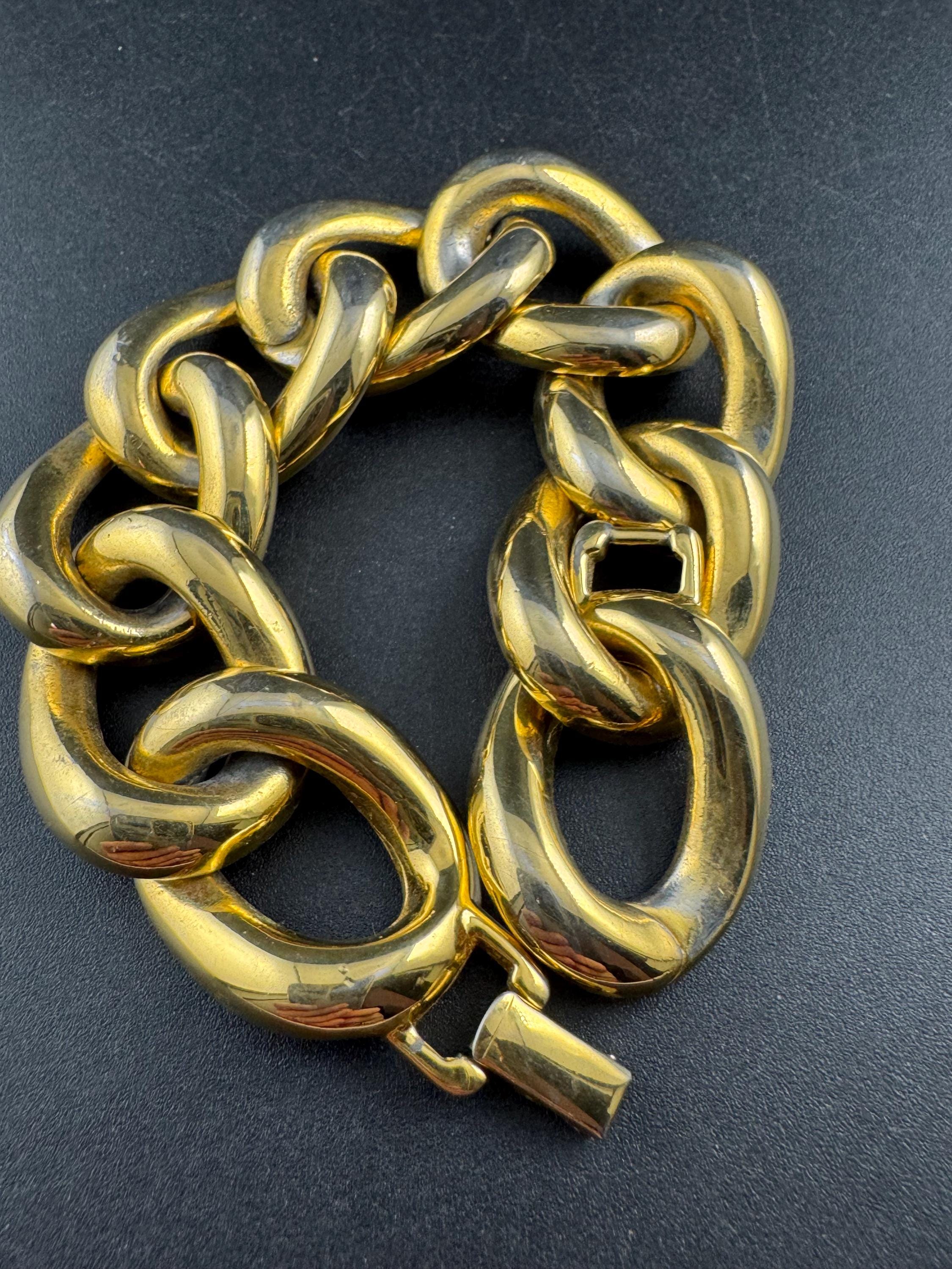 KJL chunky curb chain bracelet, wide gold tone and signed, Kenneth Jay Kane