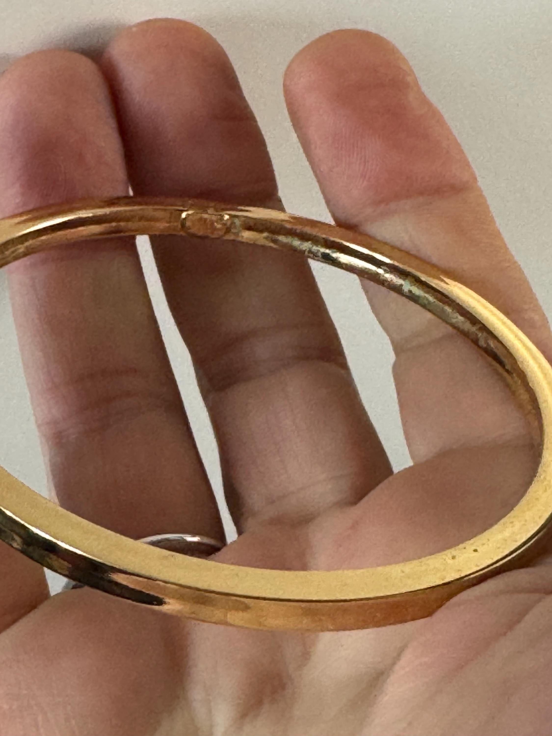 Grosse gold plated slim bangle dated 1971 , 1970s designer bracelet signed jewellery