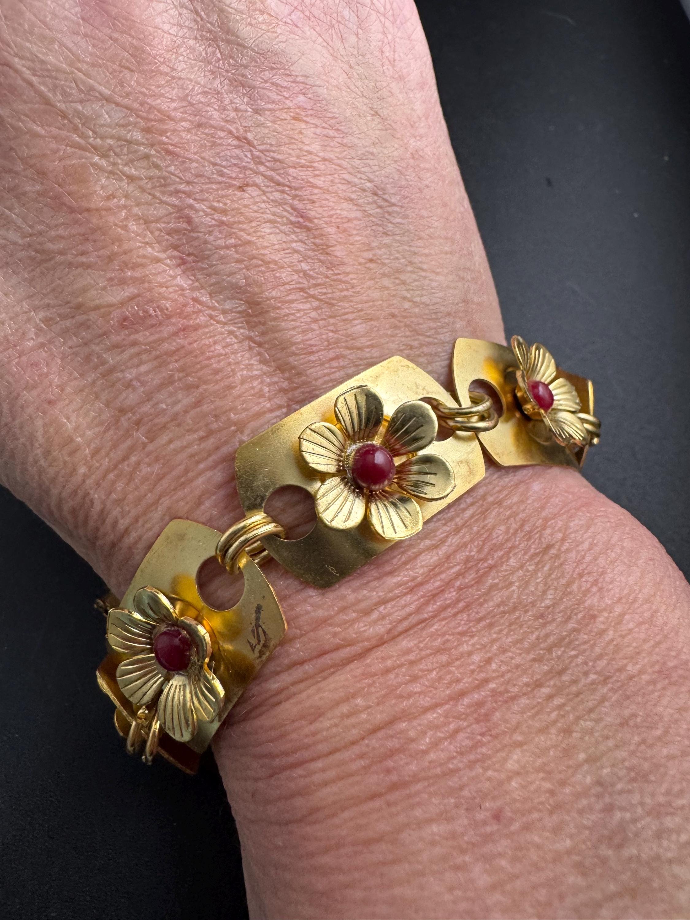 Art deco brass panel link flower bracelet , red cabochons vintage unused mid century