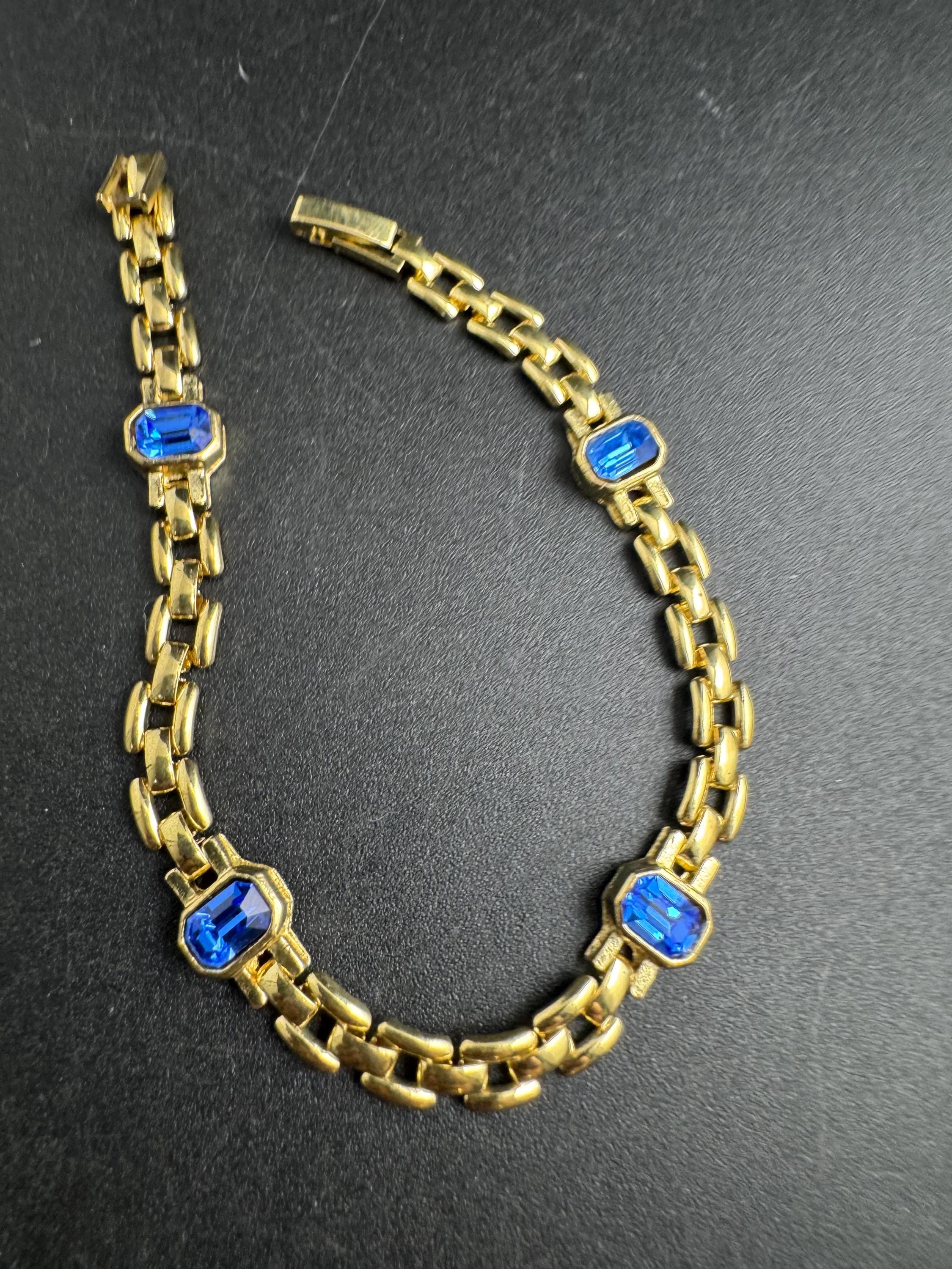 Slim Panther link rhinestone bracelet, sapphire blue octagon Swarovski crystals gold plated