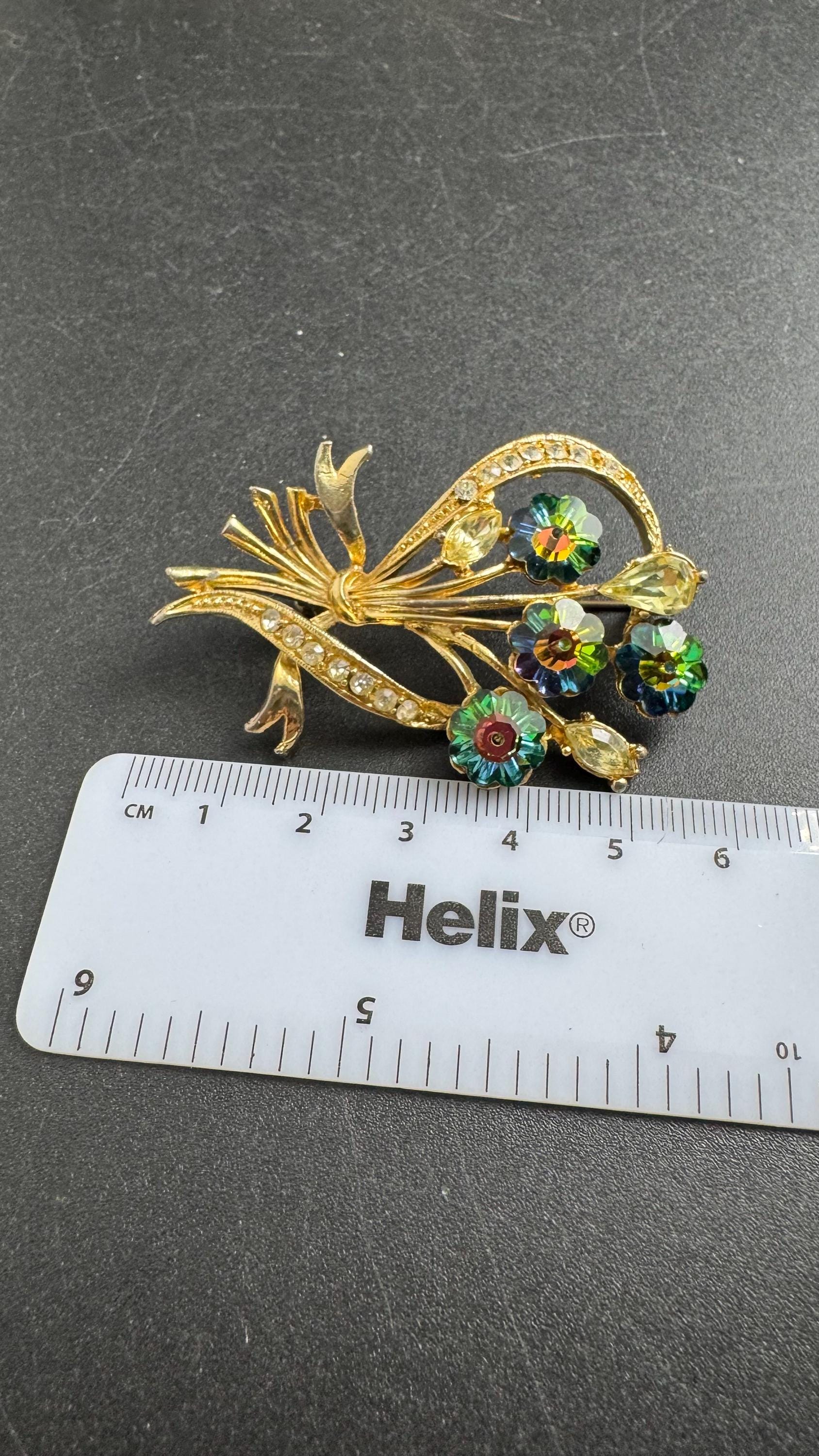 Signed EXQUISITE watermelon flower brooch, gold tone rhinestones