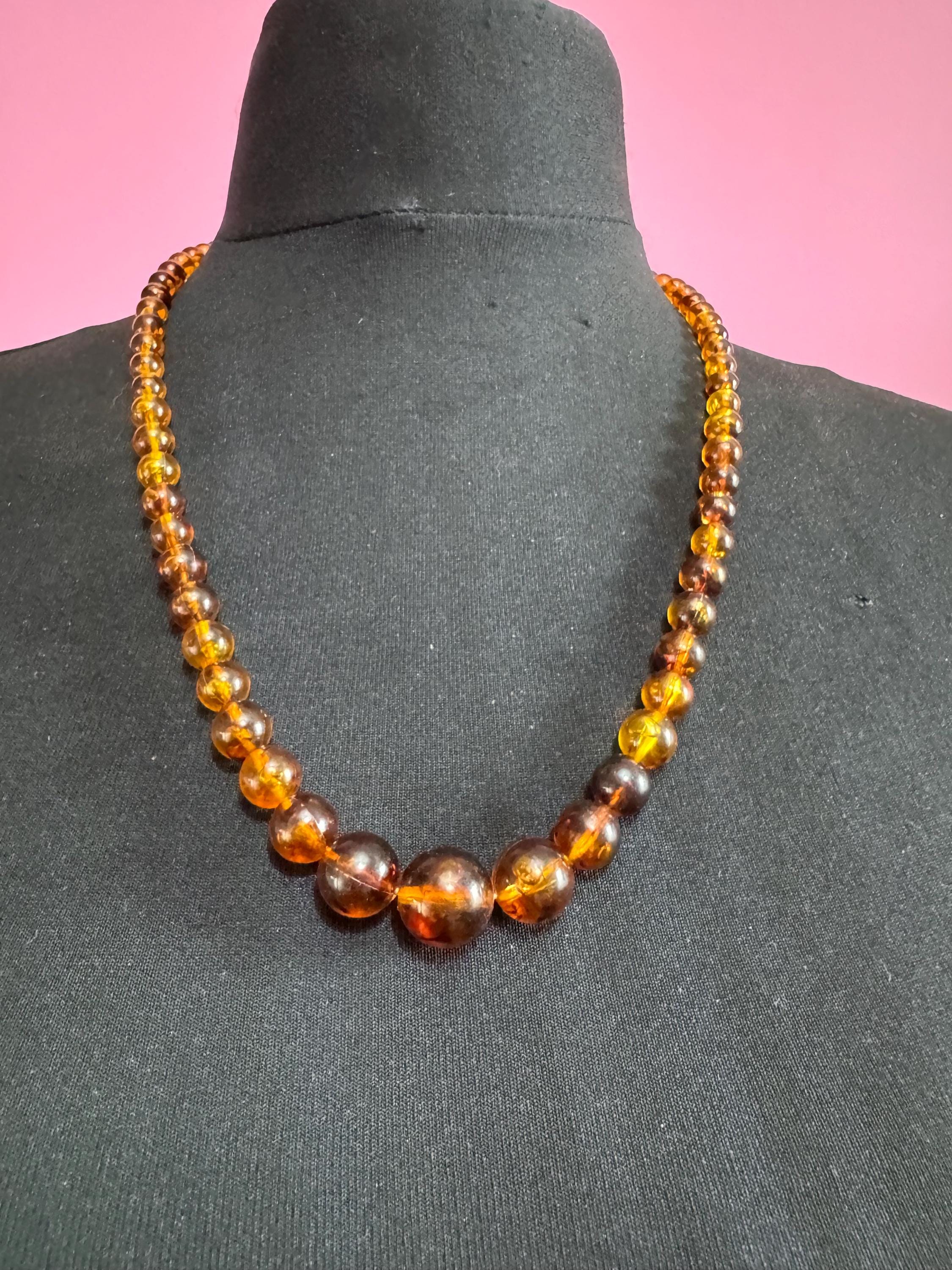 Long Faux Amber orange brown beaded necklace, plastic beads