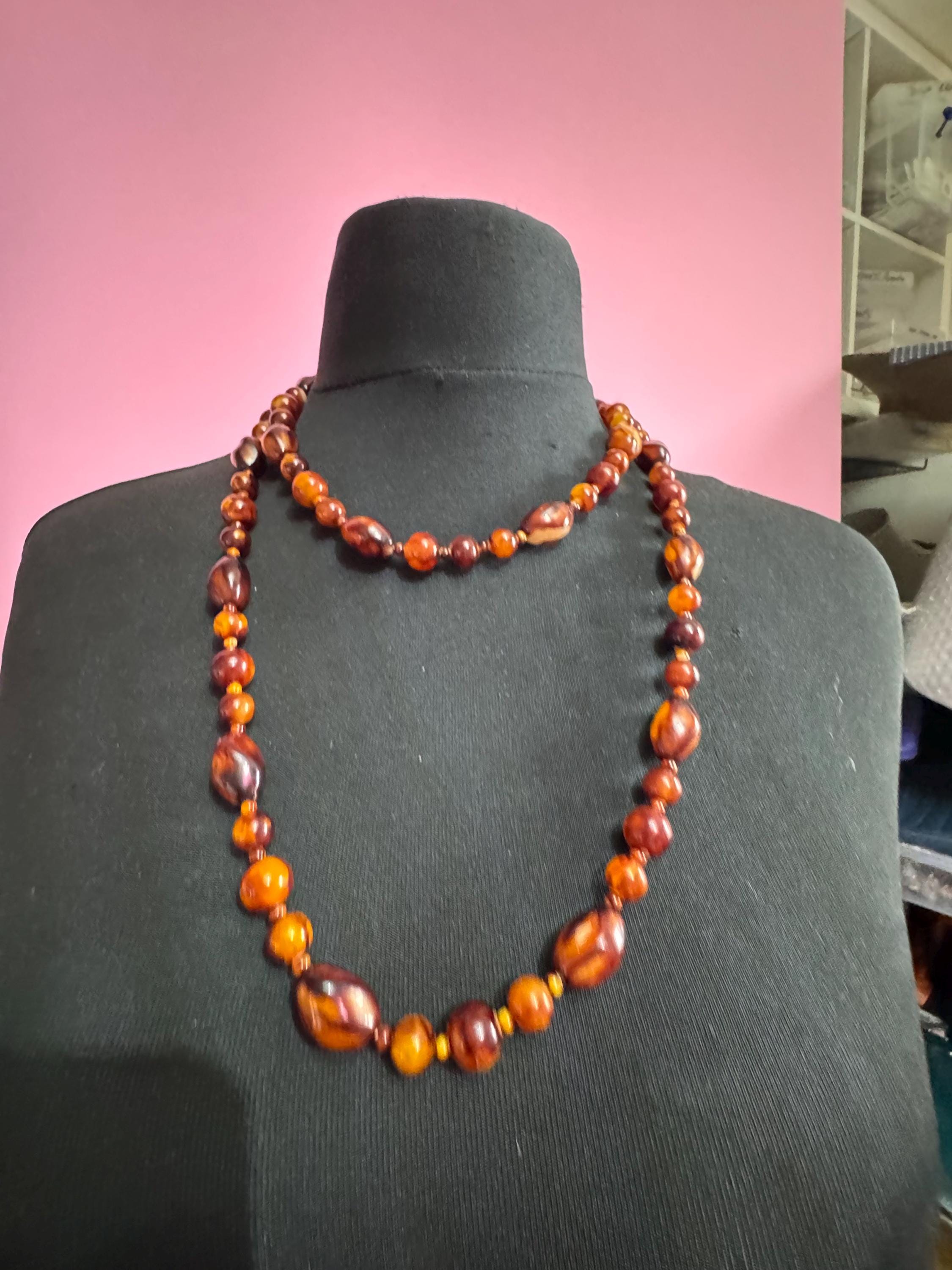 Long Faux Amber orange brown beaded necklace, plastic beads