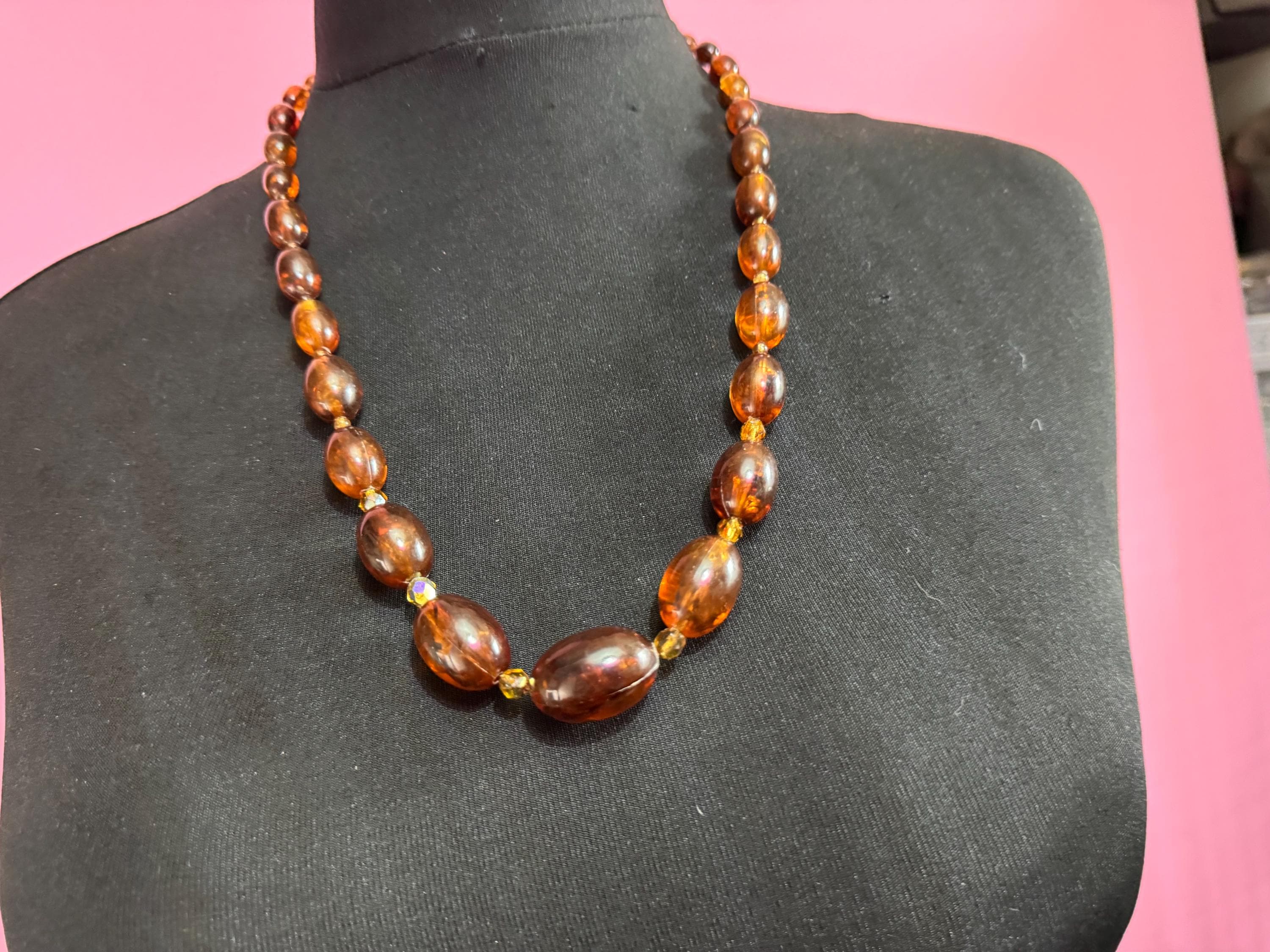 Long Faux Amber orange brown beaded necklace, oval plastic beads