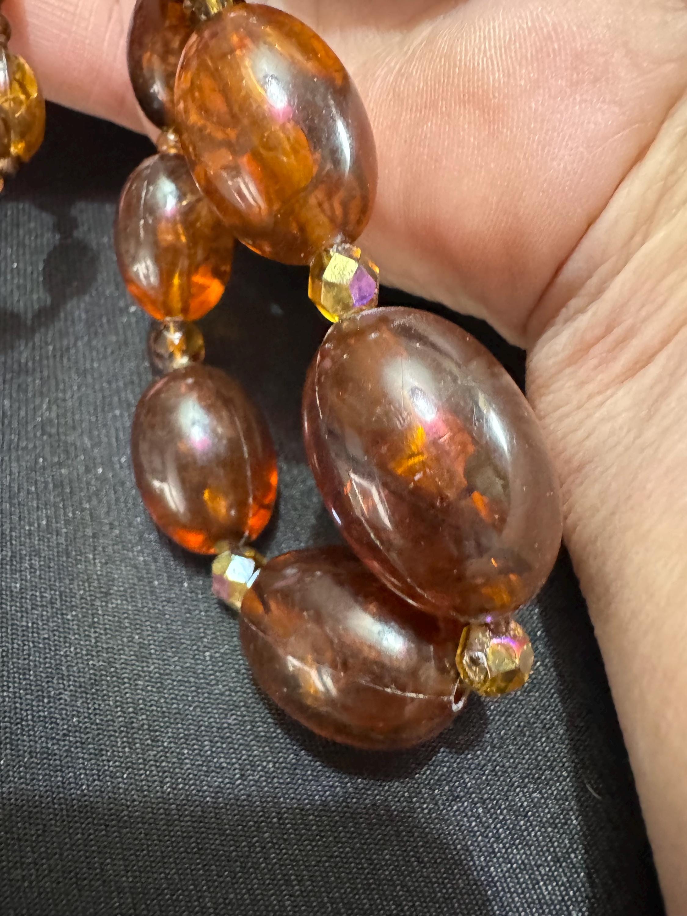 Long Faux Amber orange brown beaded necklace, oval plastic beads